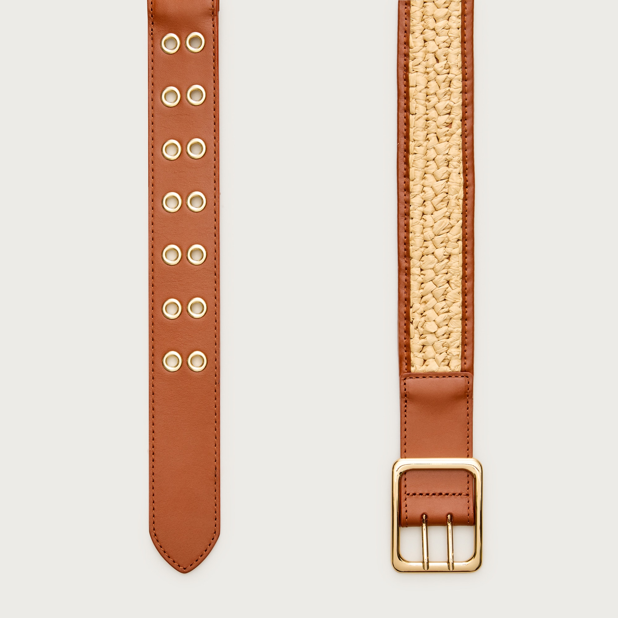 Grommet belt in leather and faux raffia