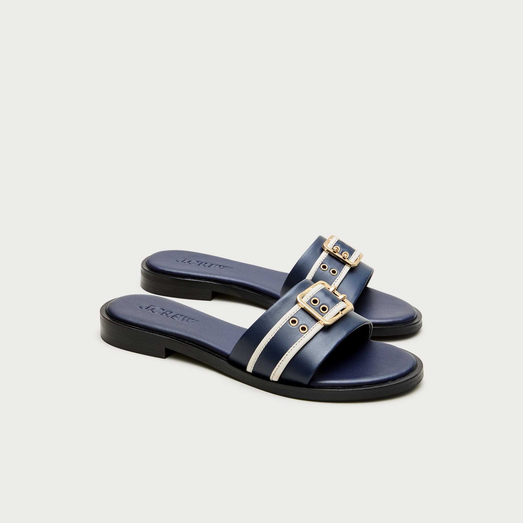 Belted sandals in leather
