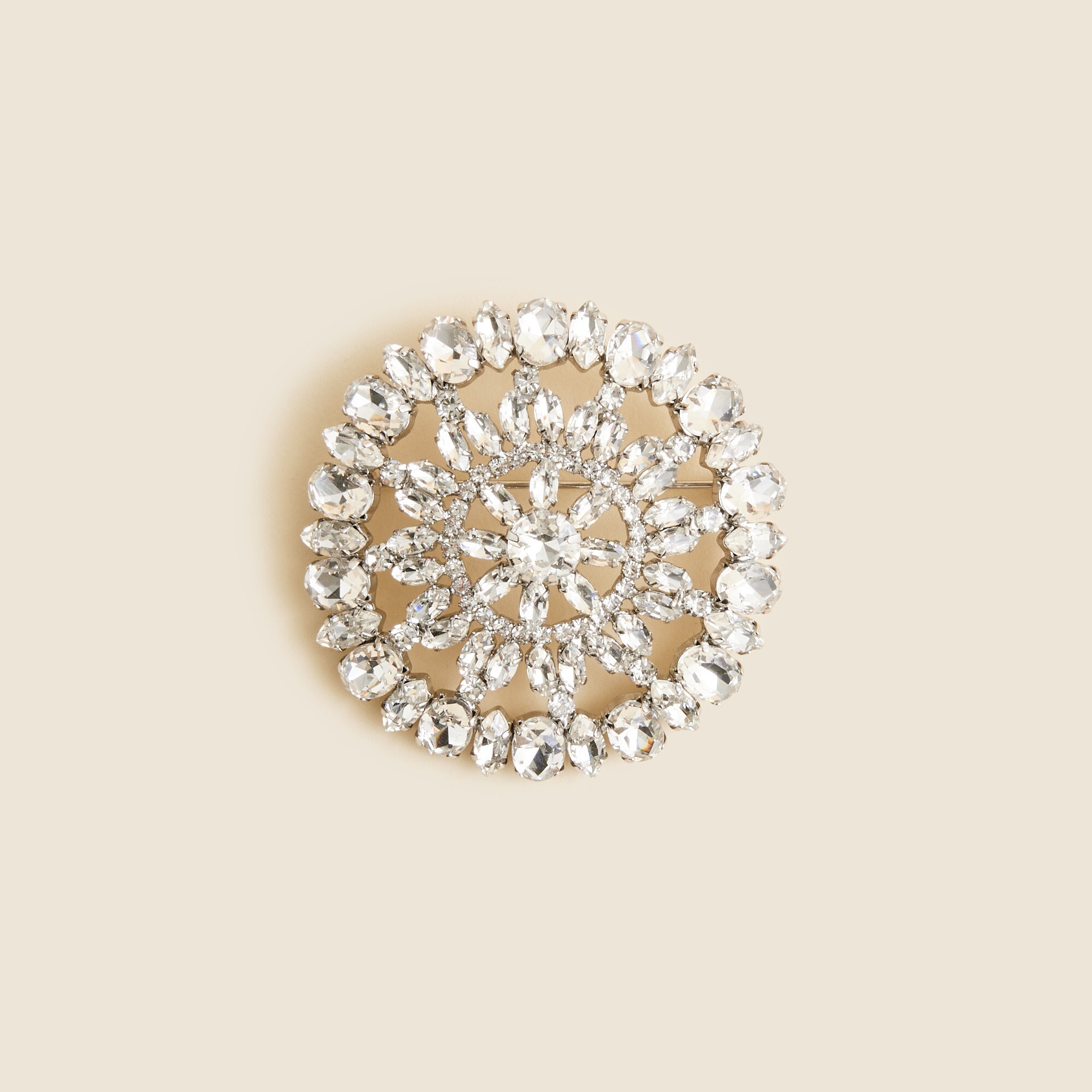 Round crystal brooch