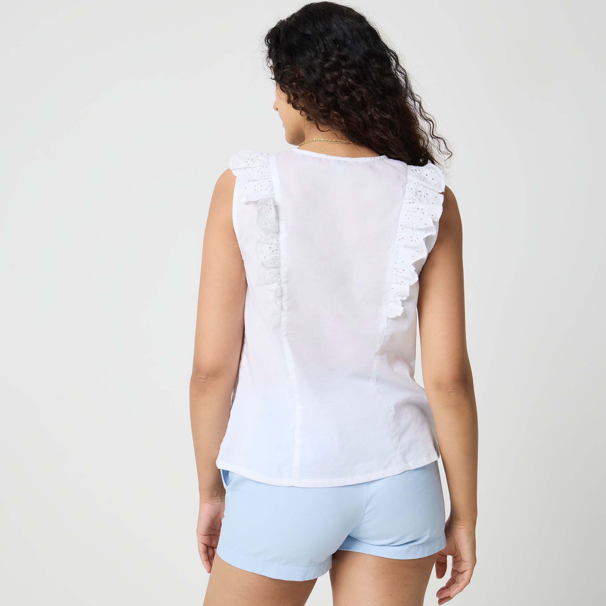 Eyelet flutter-sleeve top