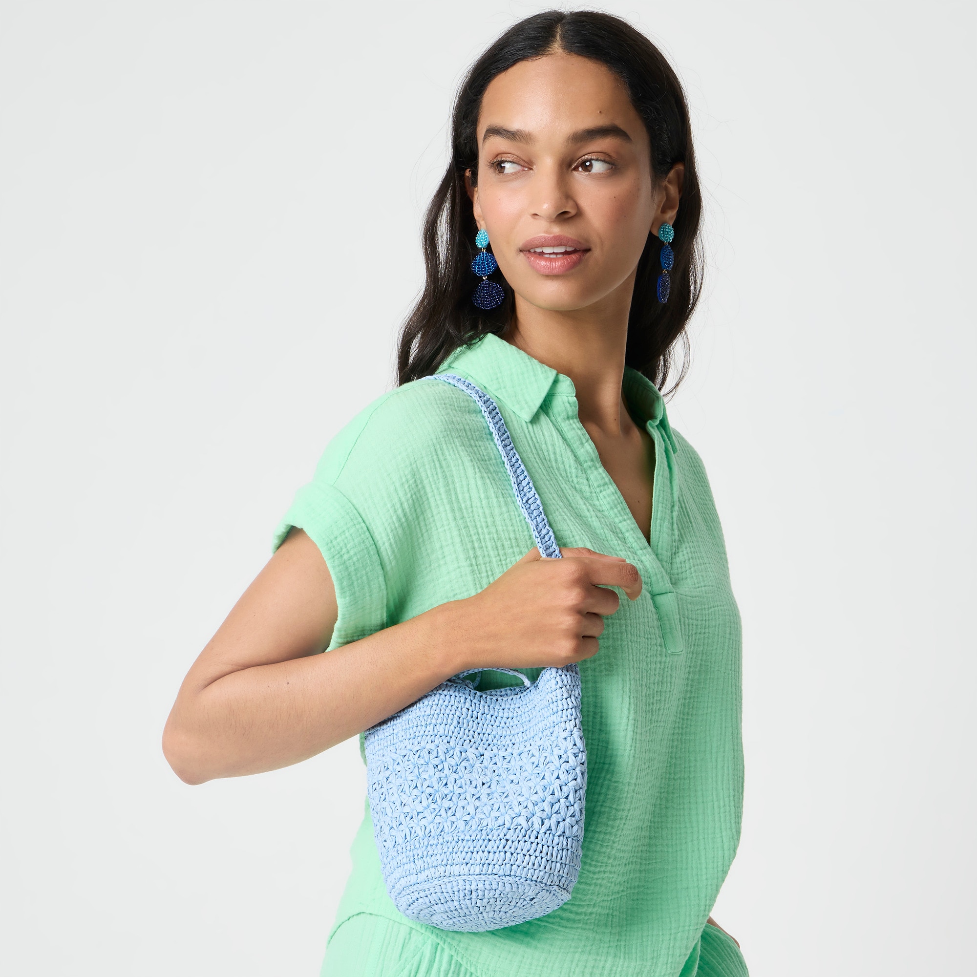 Floral woven bucket bag