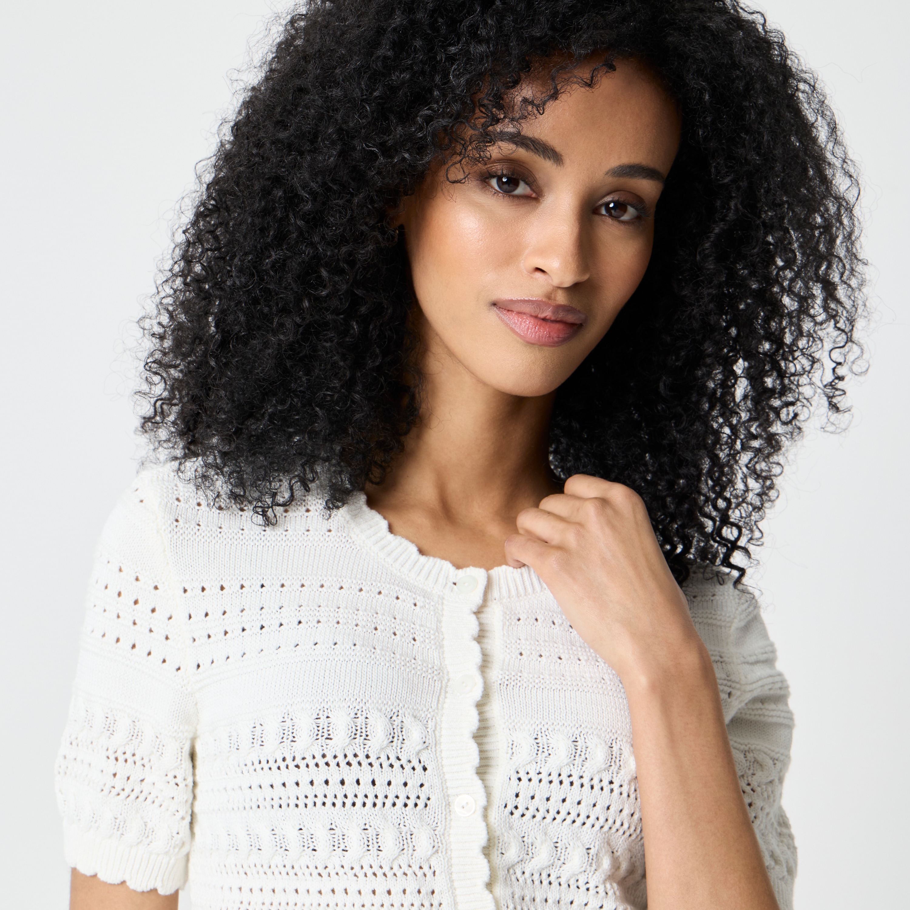 Short-sleeve pointelle cardigan sweater