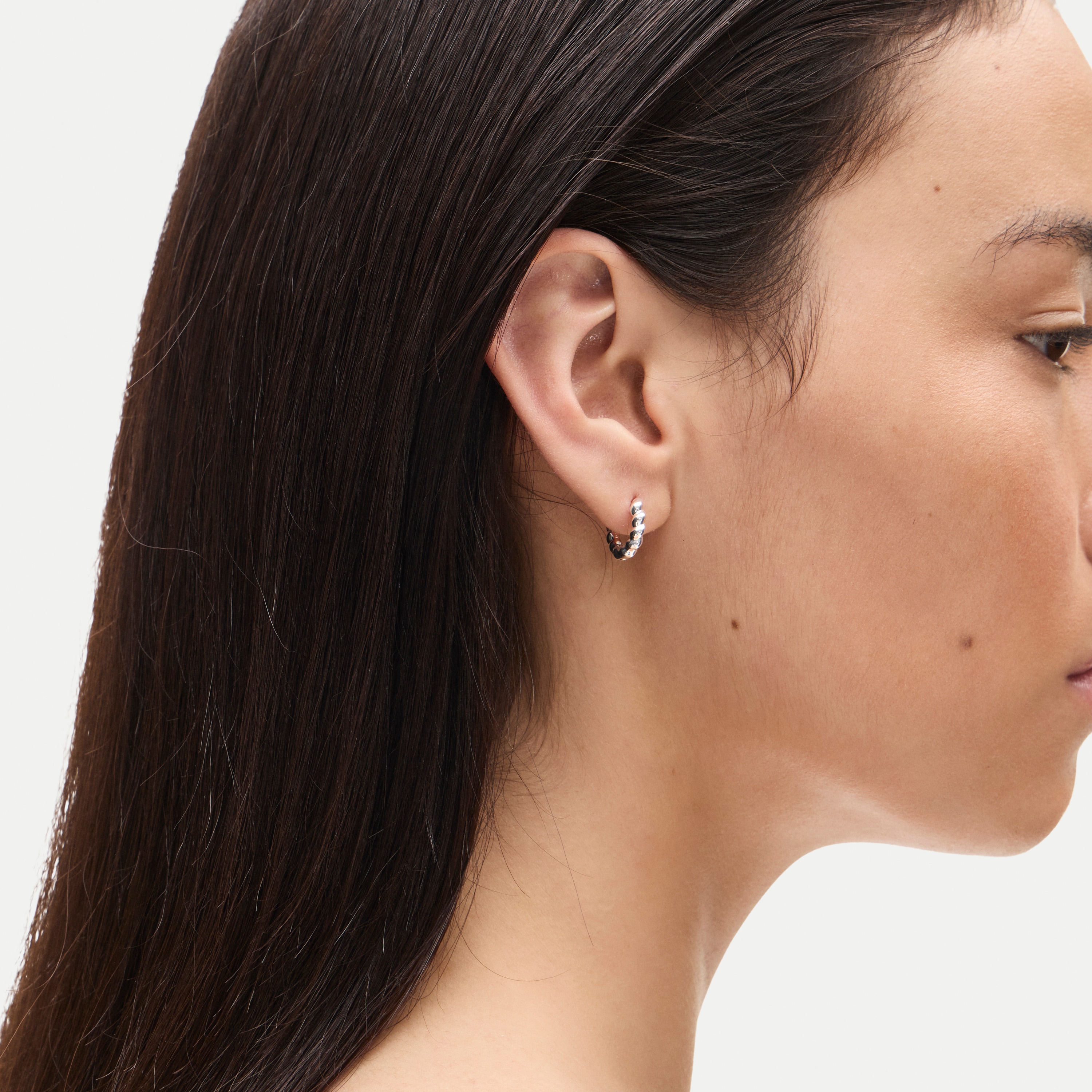 Mini metallic twist huggie earrings