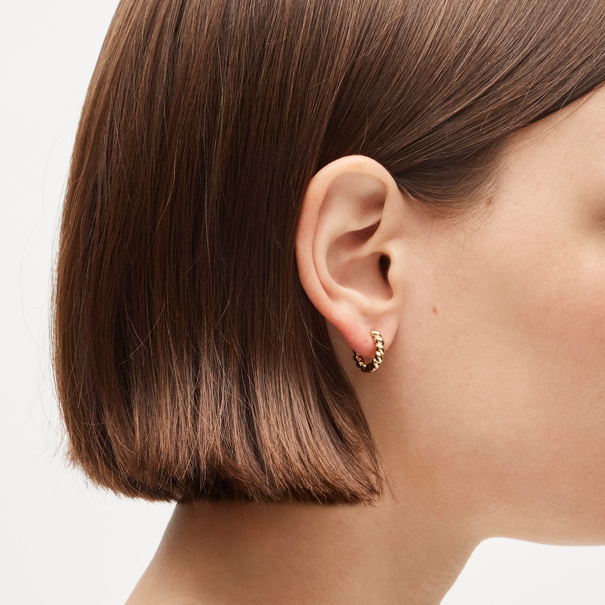 Mini metallic twist huggie earrings