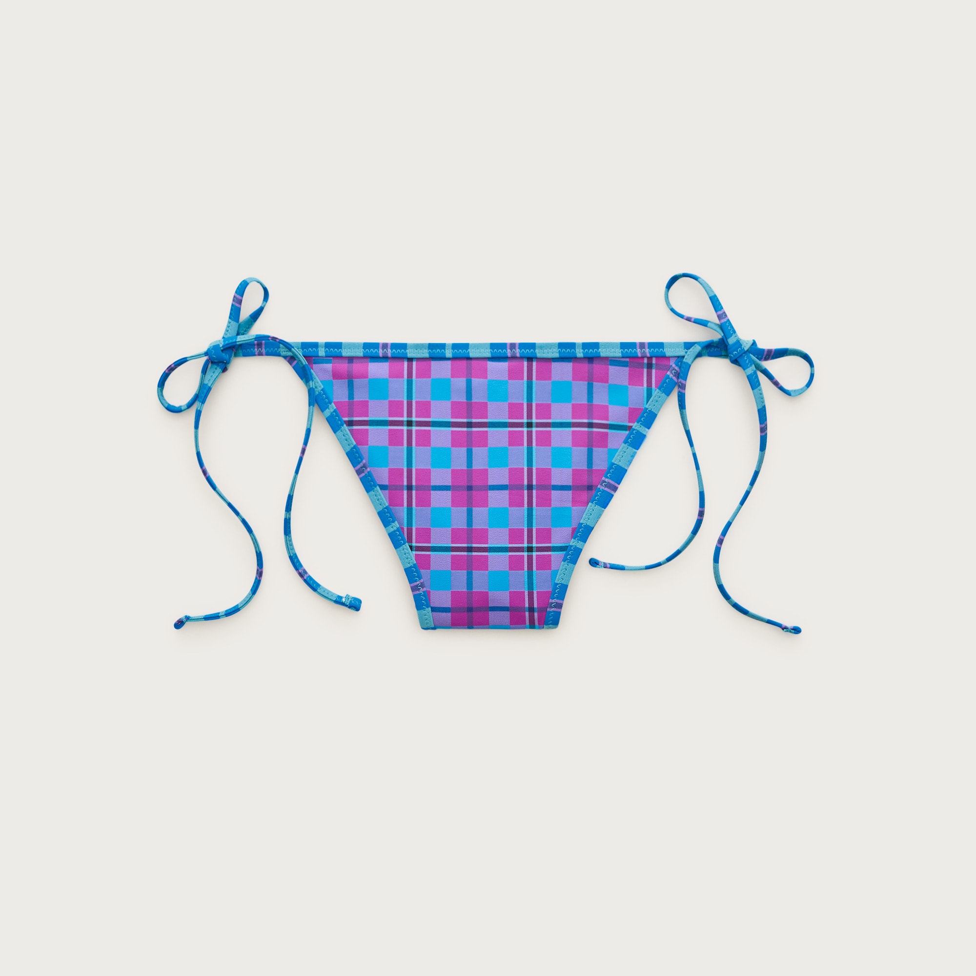 Cheeky string bikini bottom in reversible plaid from J.Crew - $44.50