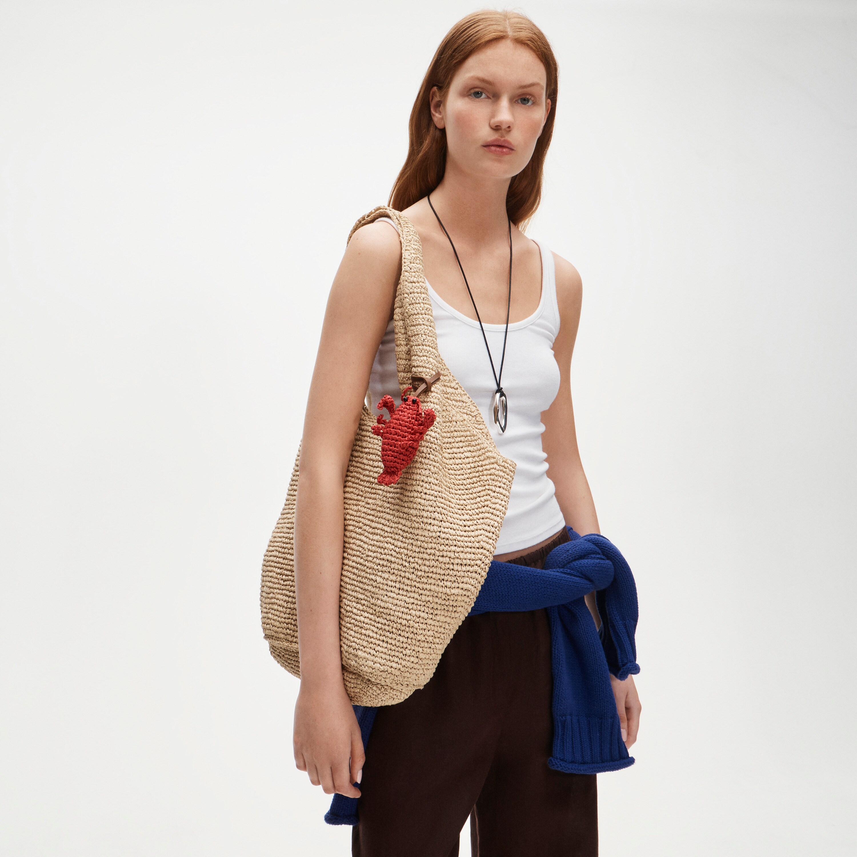Handwoven raffia lobster bag charm