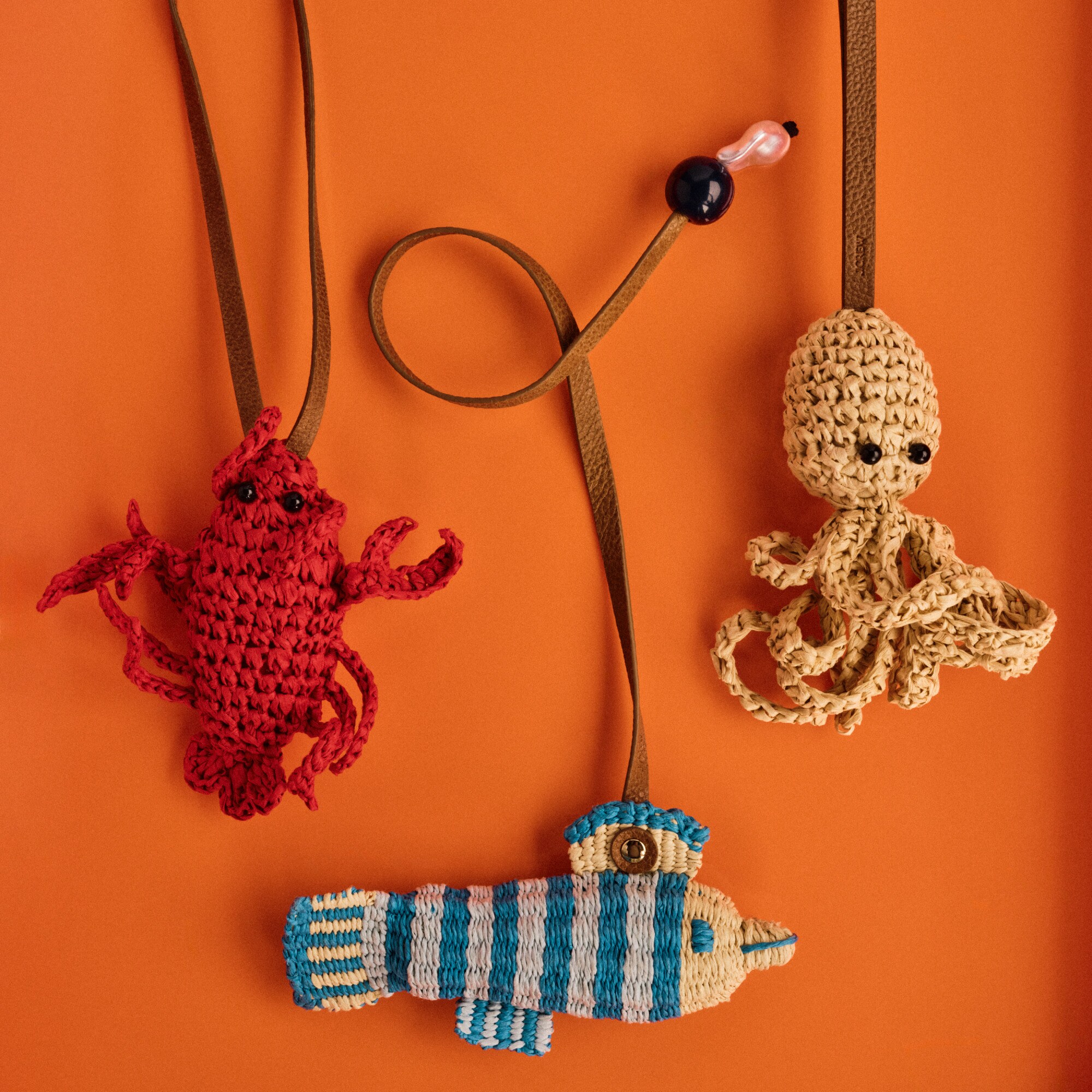 Handwoven raffia lobster bag charm