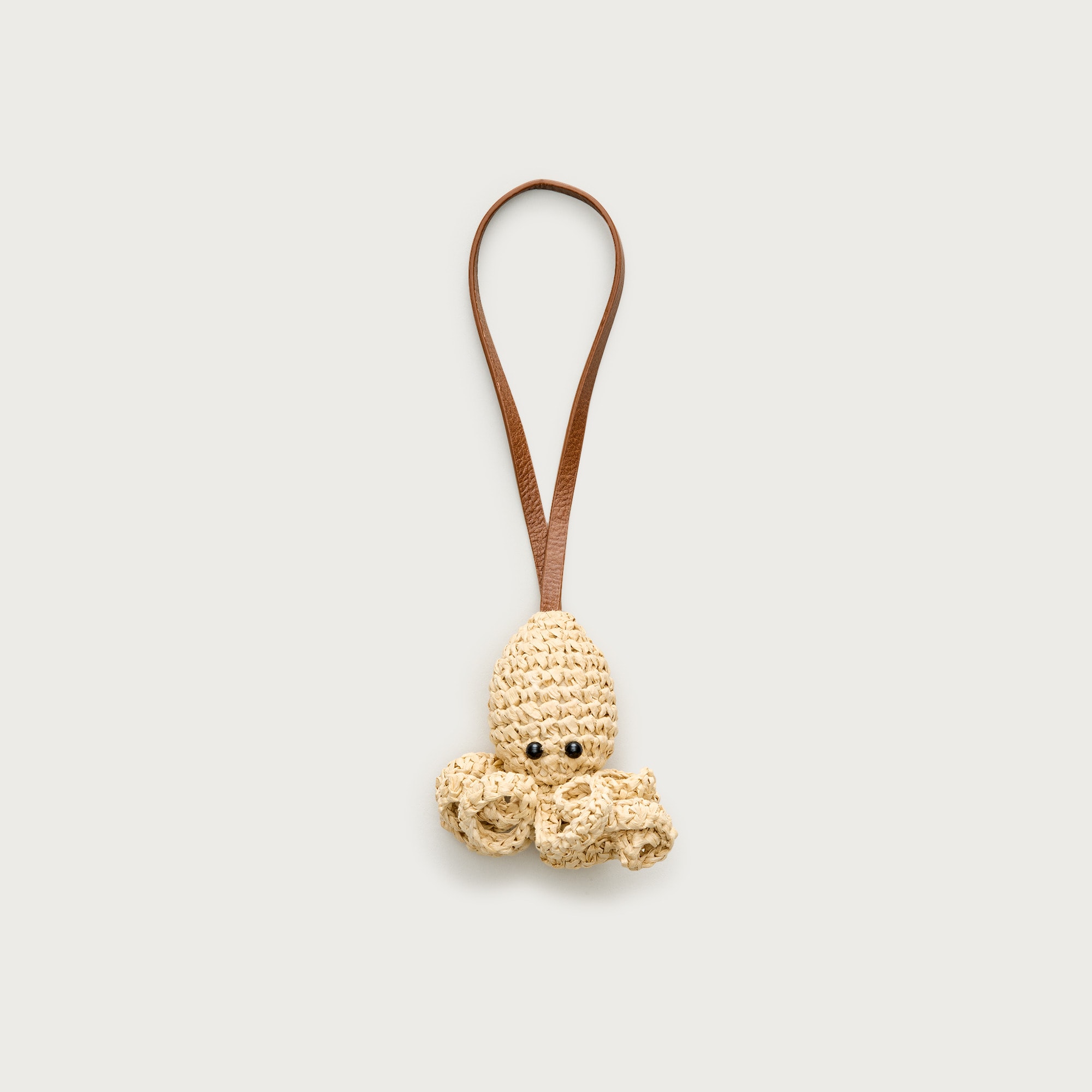Handwoven raffia octopus bag charm