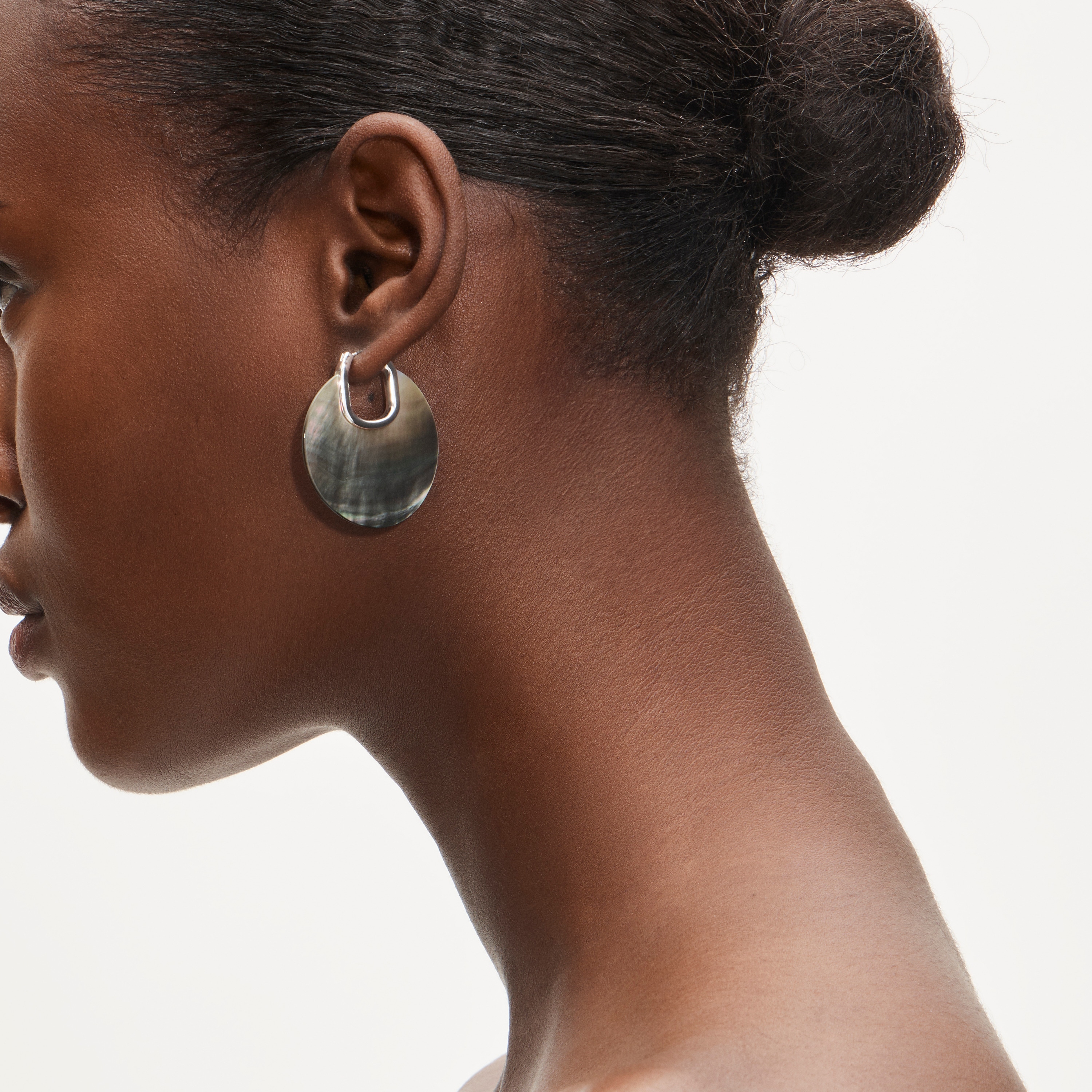 Mother-of-pearl disc earrings $50