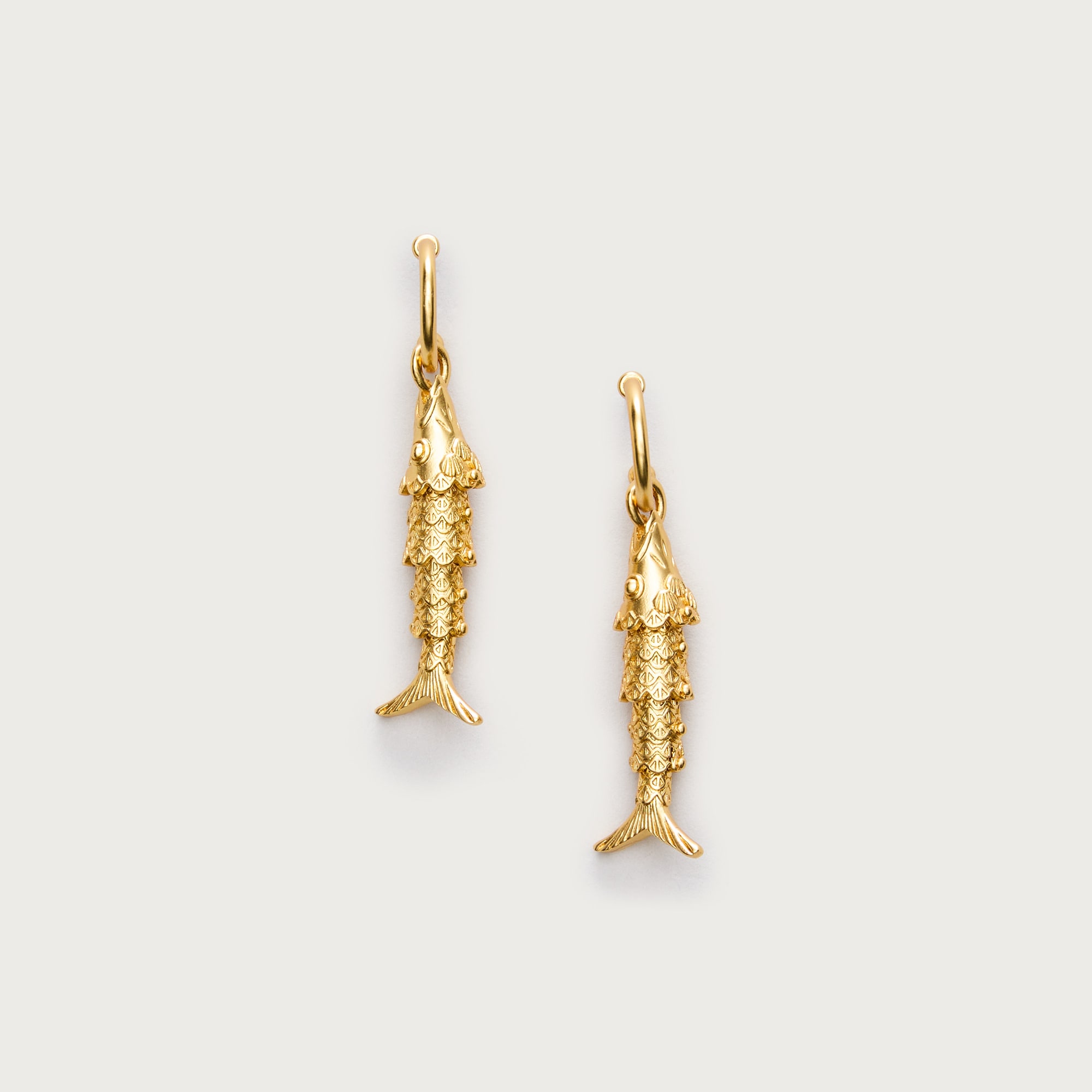 Fish huggie hoop earrings
