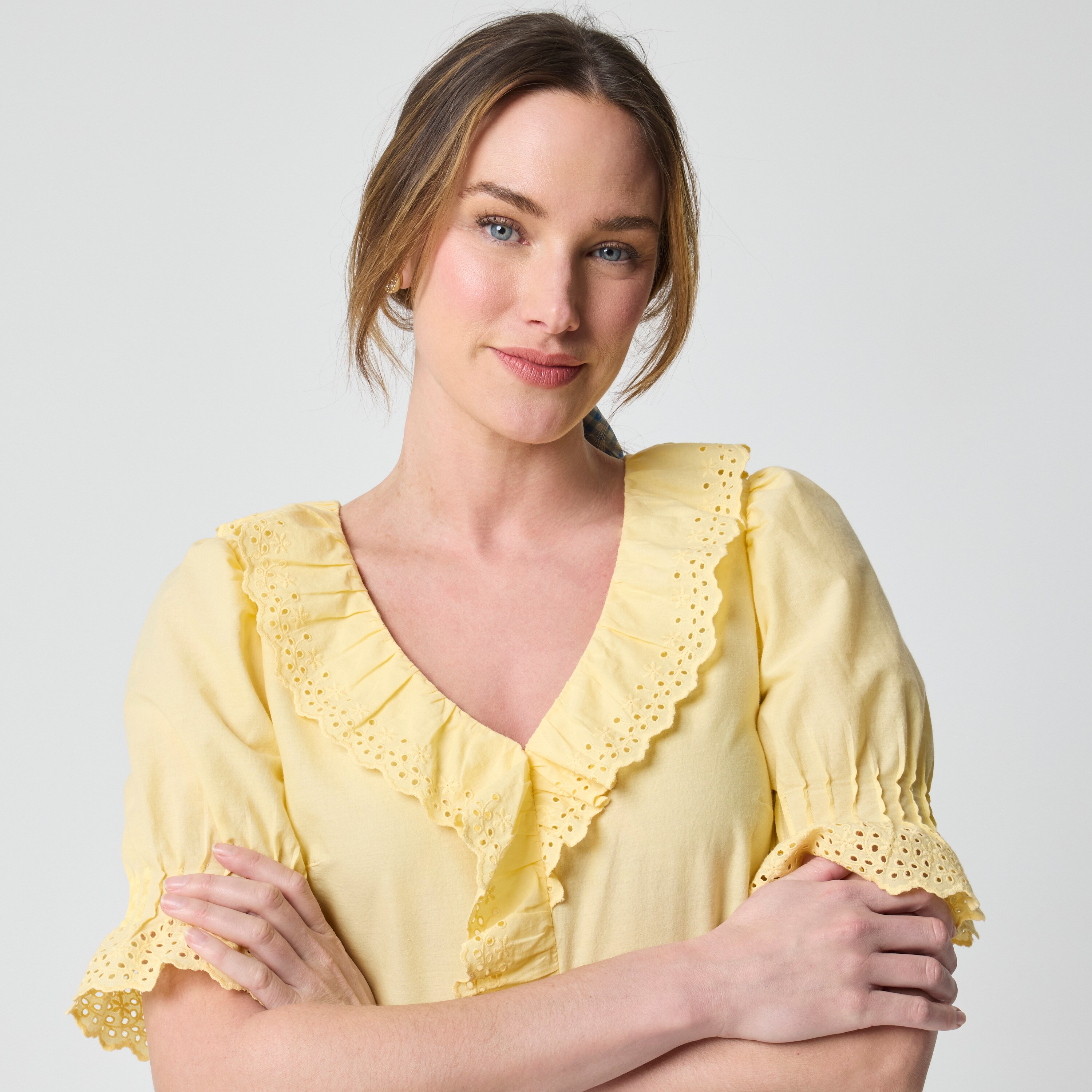 Eyelet ruffle-front top
