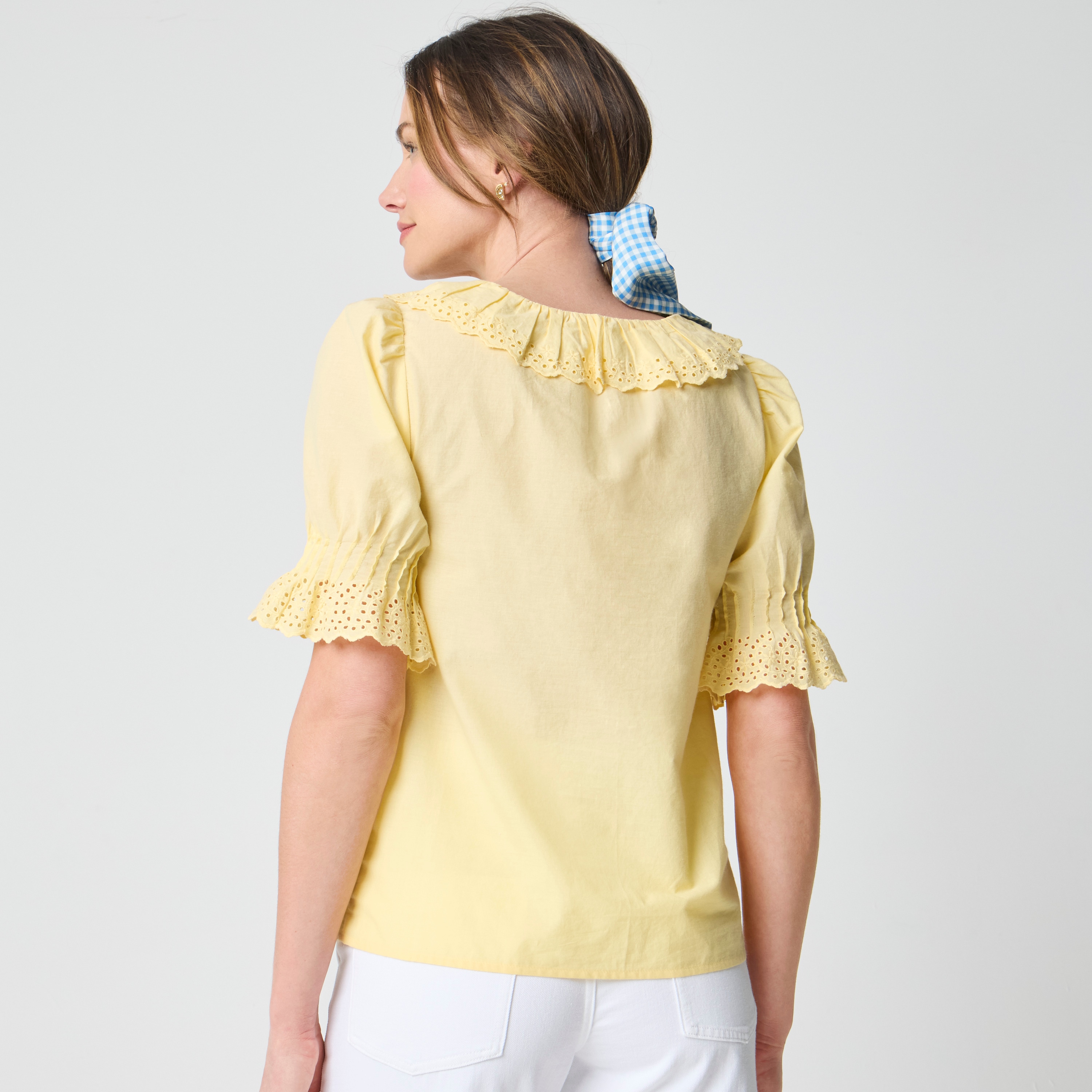 Eyelet ruffle-front top