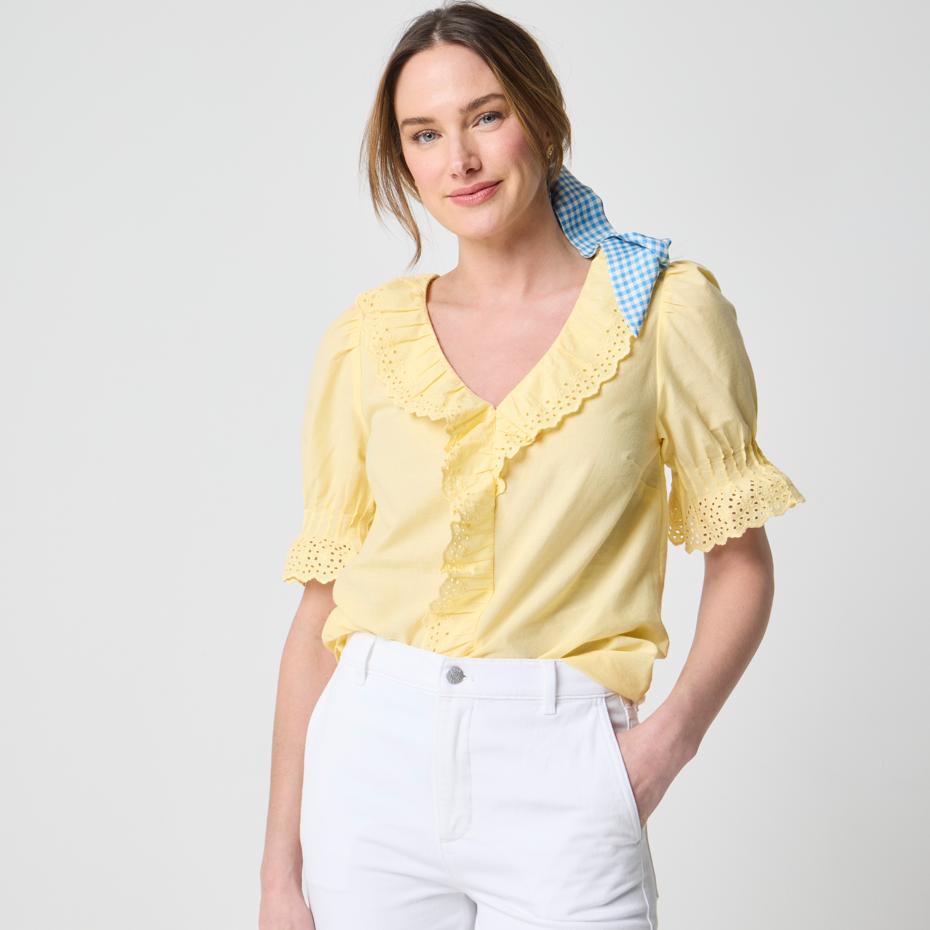 Eyelet ruffle-front top