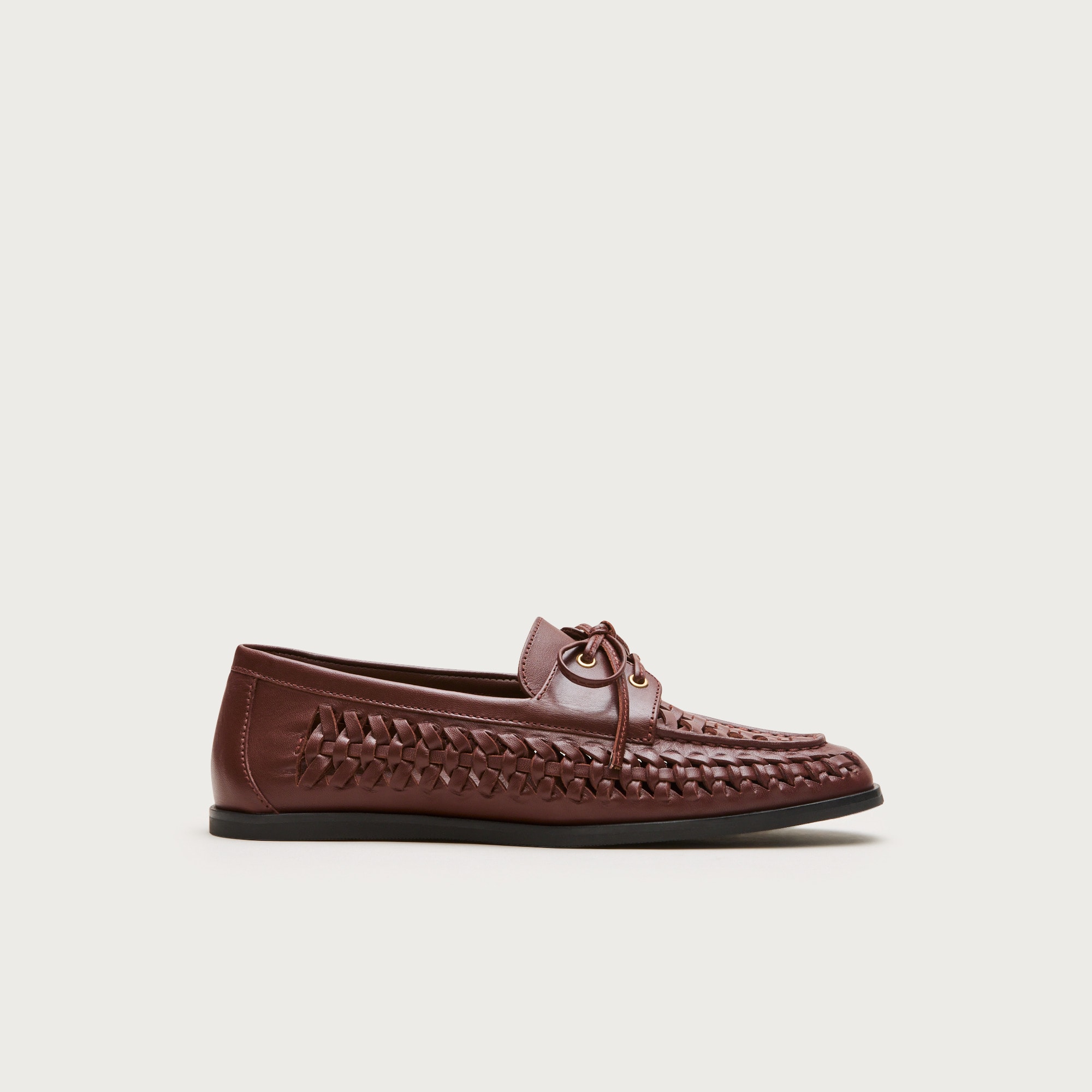 Woven leather boat shoes