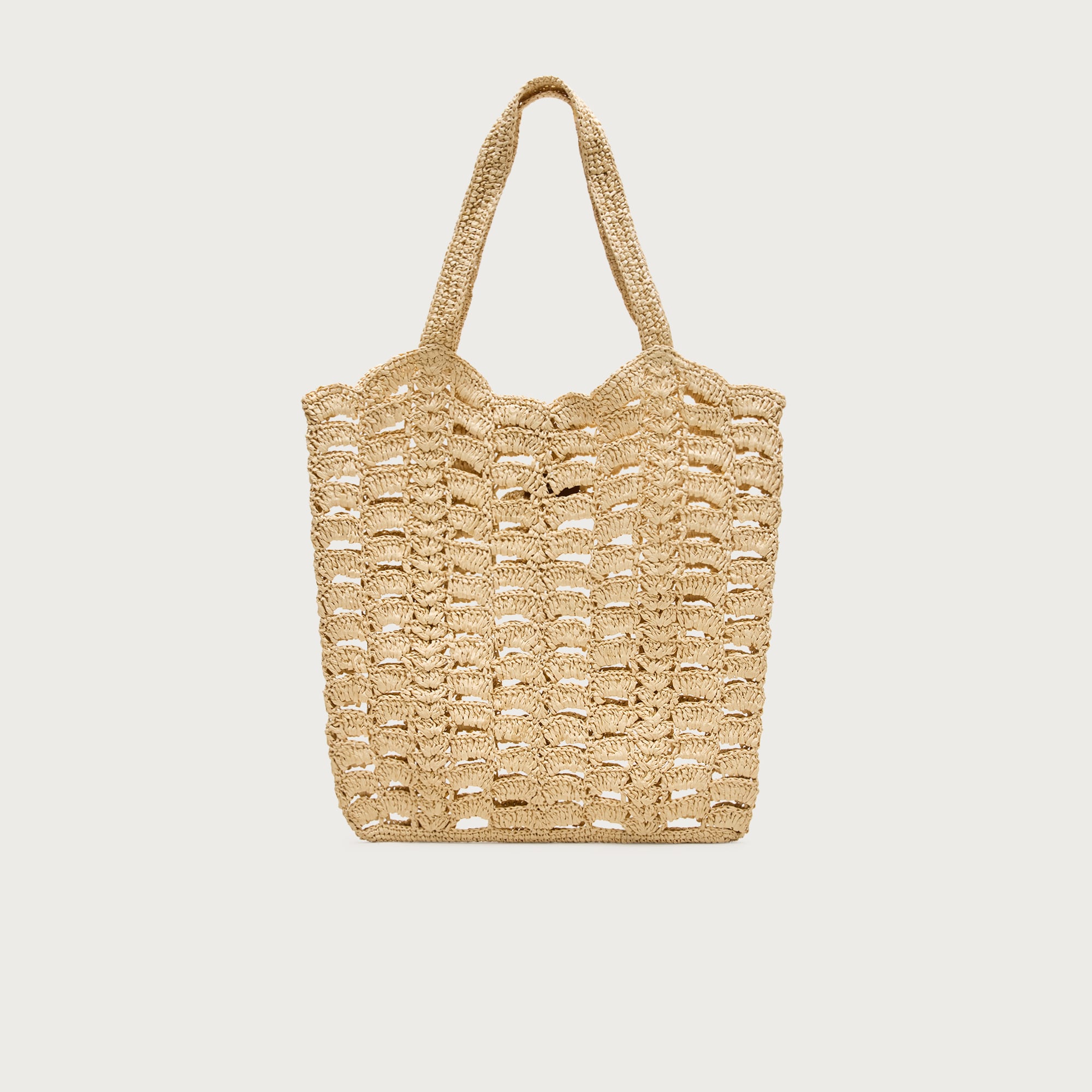 Handwoven straw tote bag