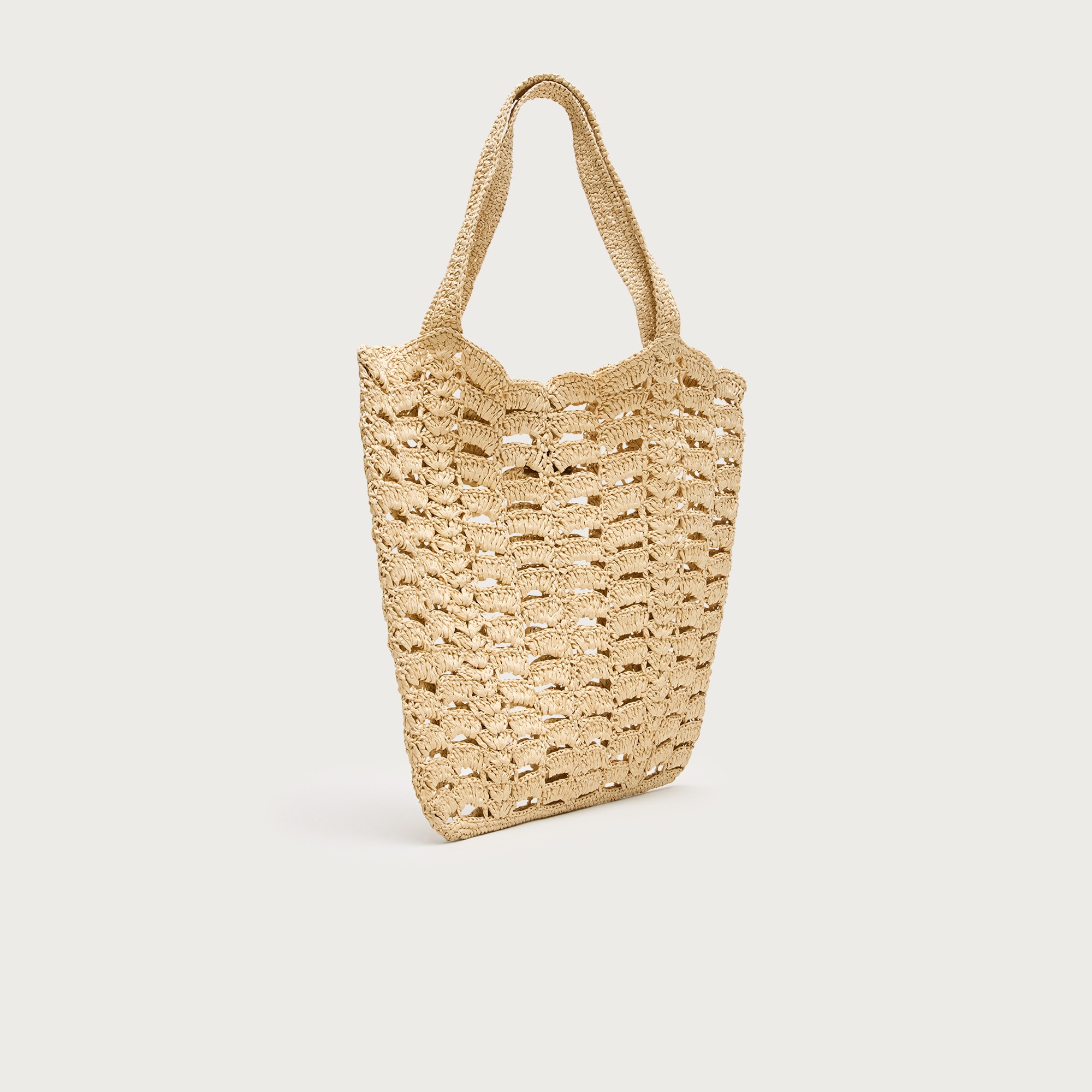 Handwoven straw tote bag