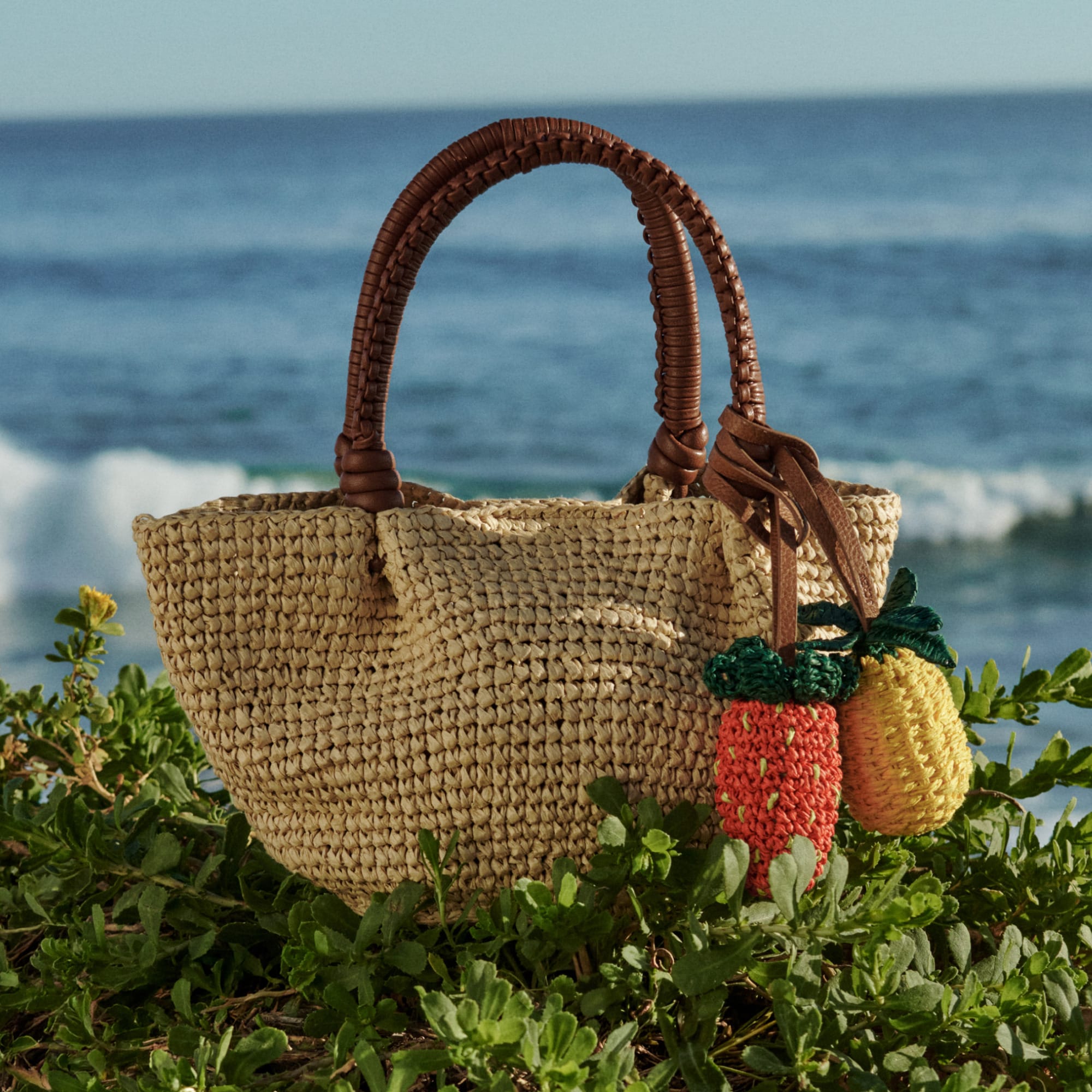 Small handknotted top-handle bag