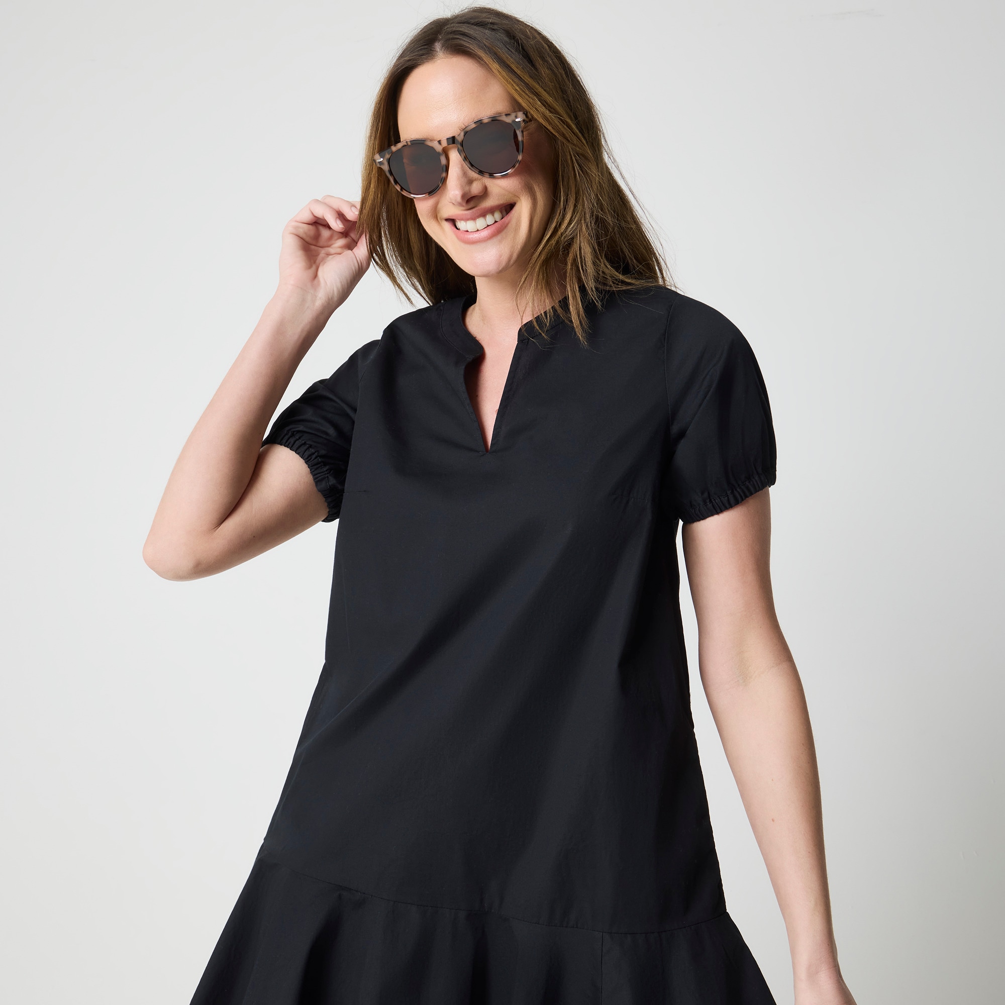 black sweater dress off the shoulder Michaela Black Off The Shoulder Knit Dress main image 1