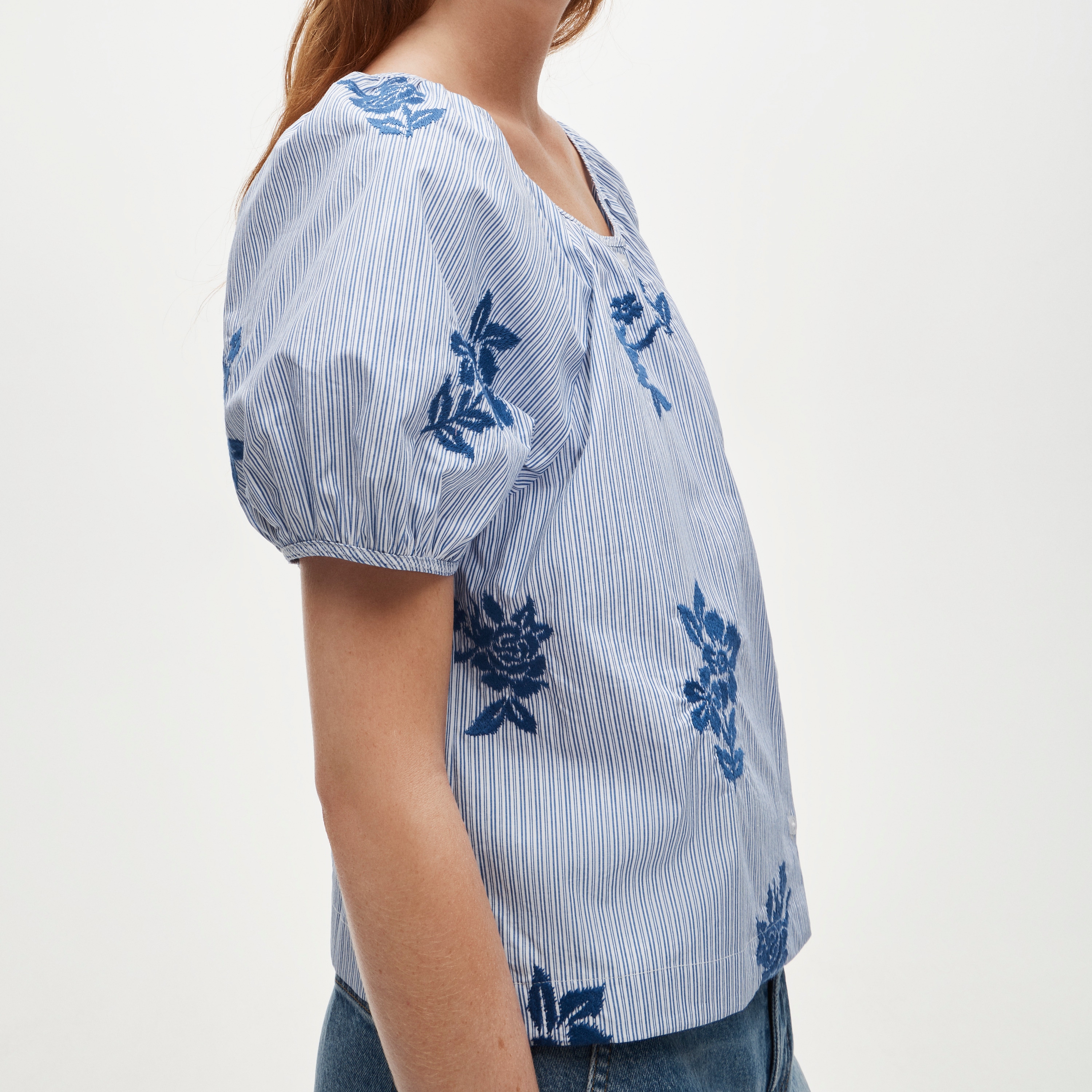 Puff-sleeve button-up top in embroidered floral stripe