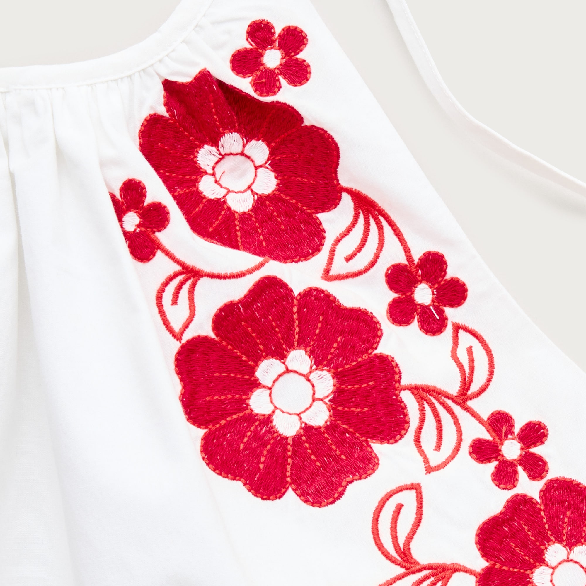 Halter tank top with floral embroidery
