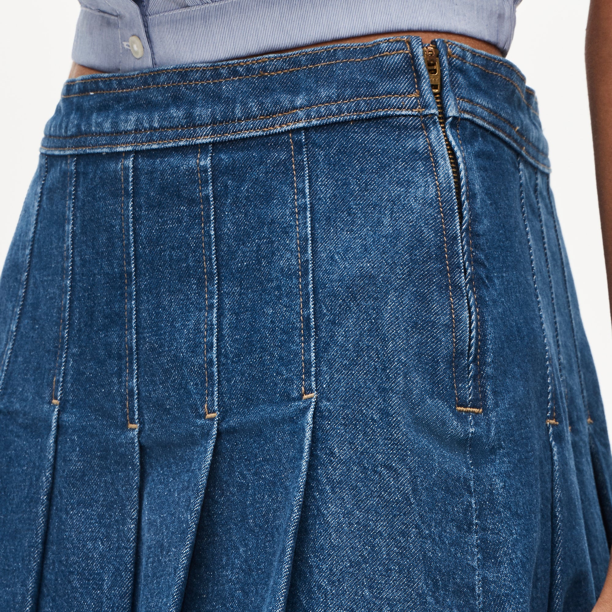 Pleated denim mini skirt