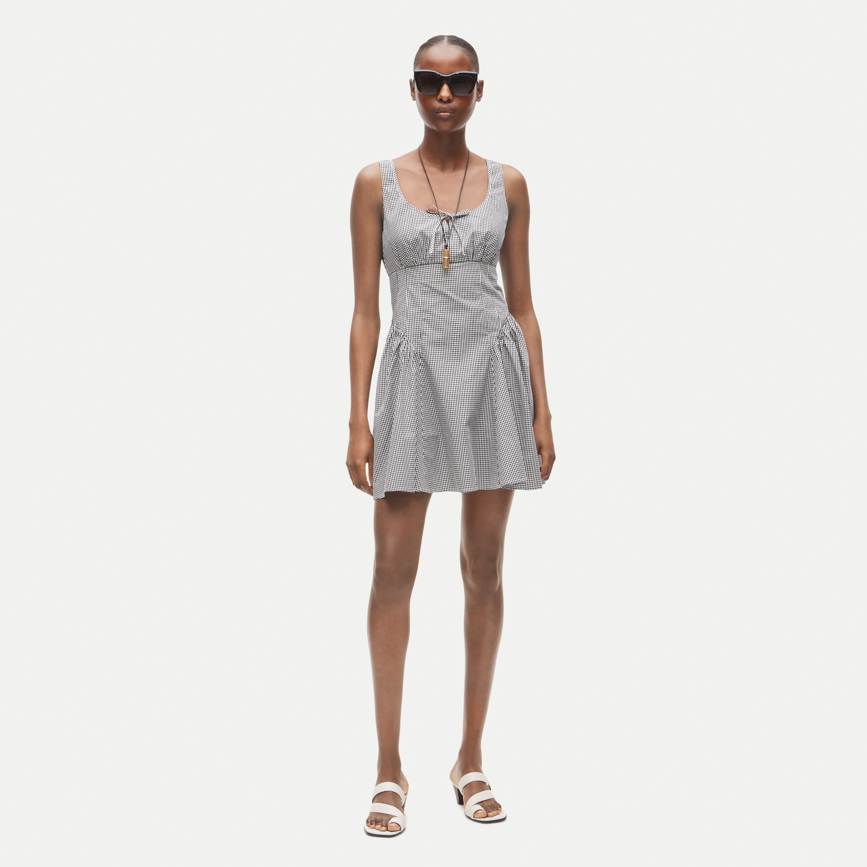 Empire-waist mini dress in gingham cotton poplin