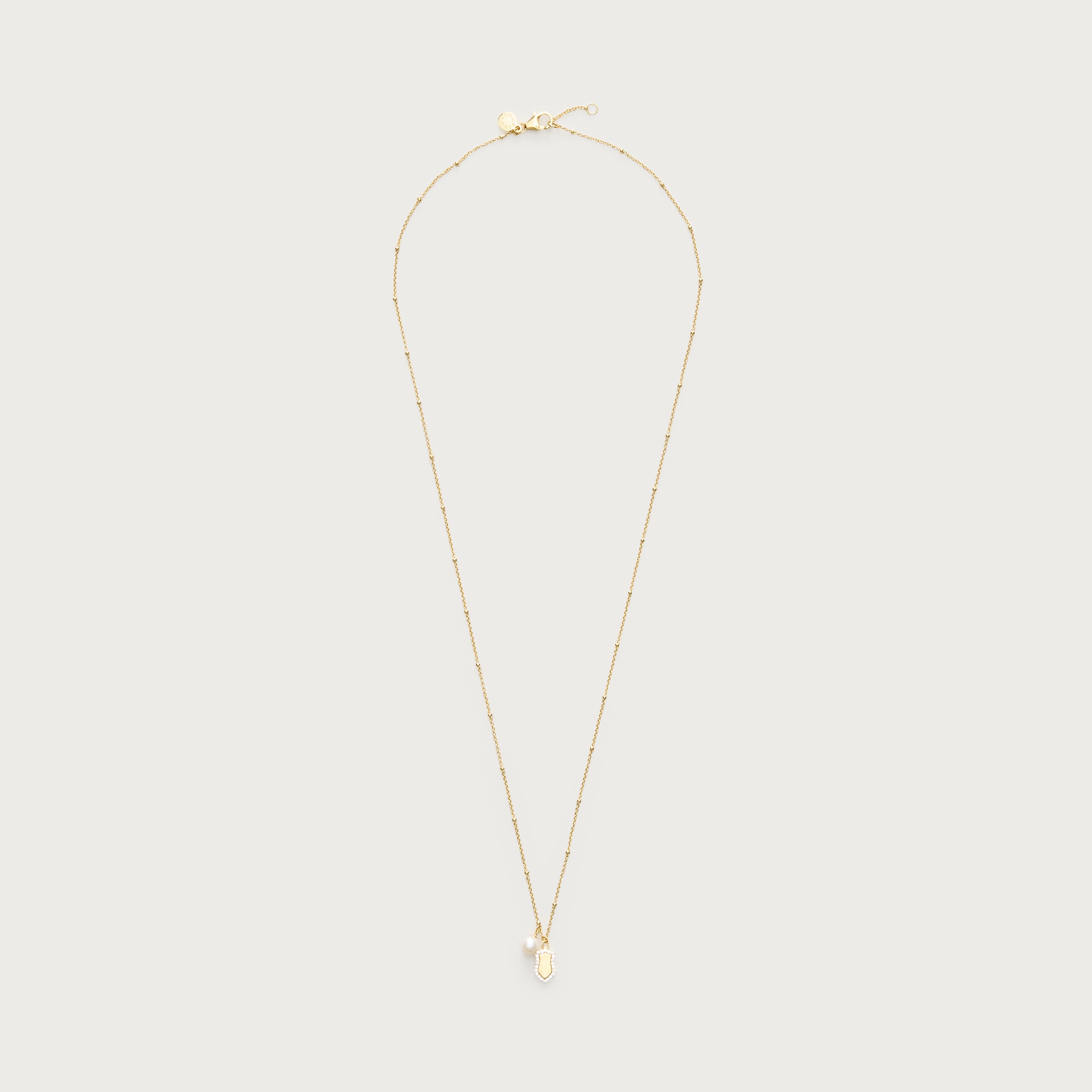 Gold vermeil freshwater pearl charm necklace from J.Crew - $165