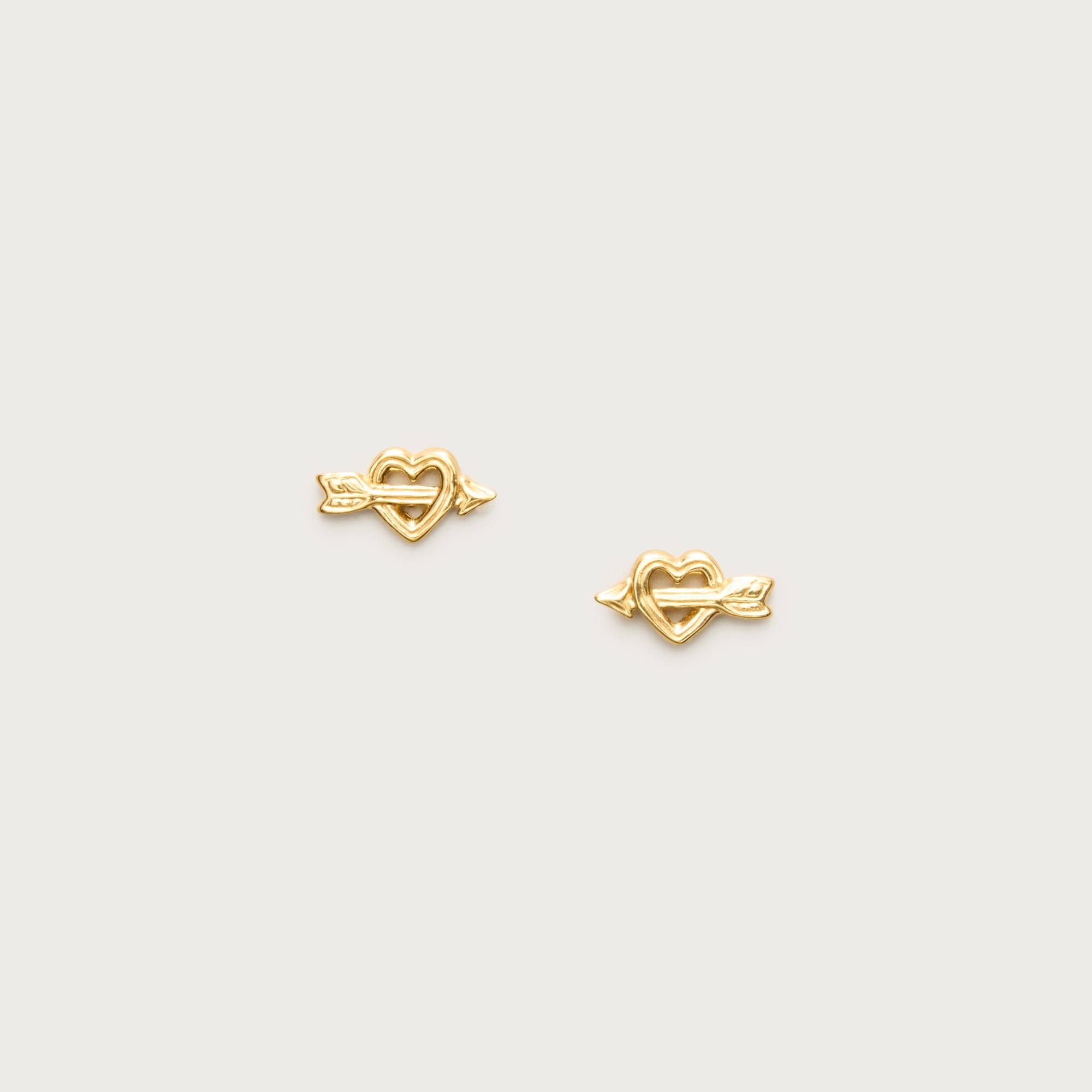 Gold vermeil heart and arrow earrings from J.Crew - $86