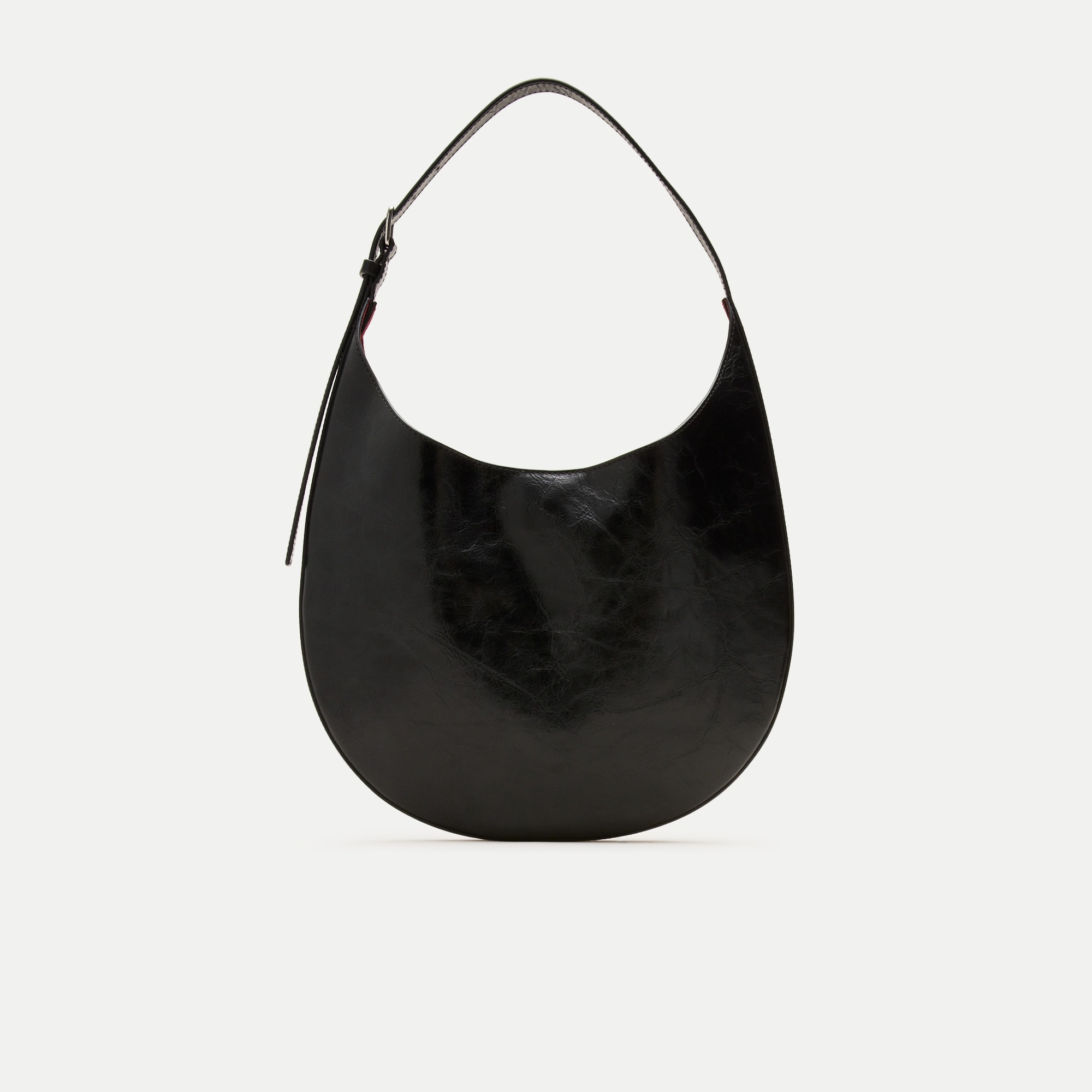 Round shoulder bag in crackled leather