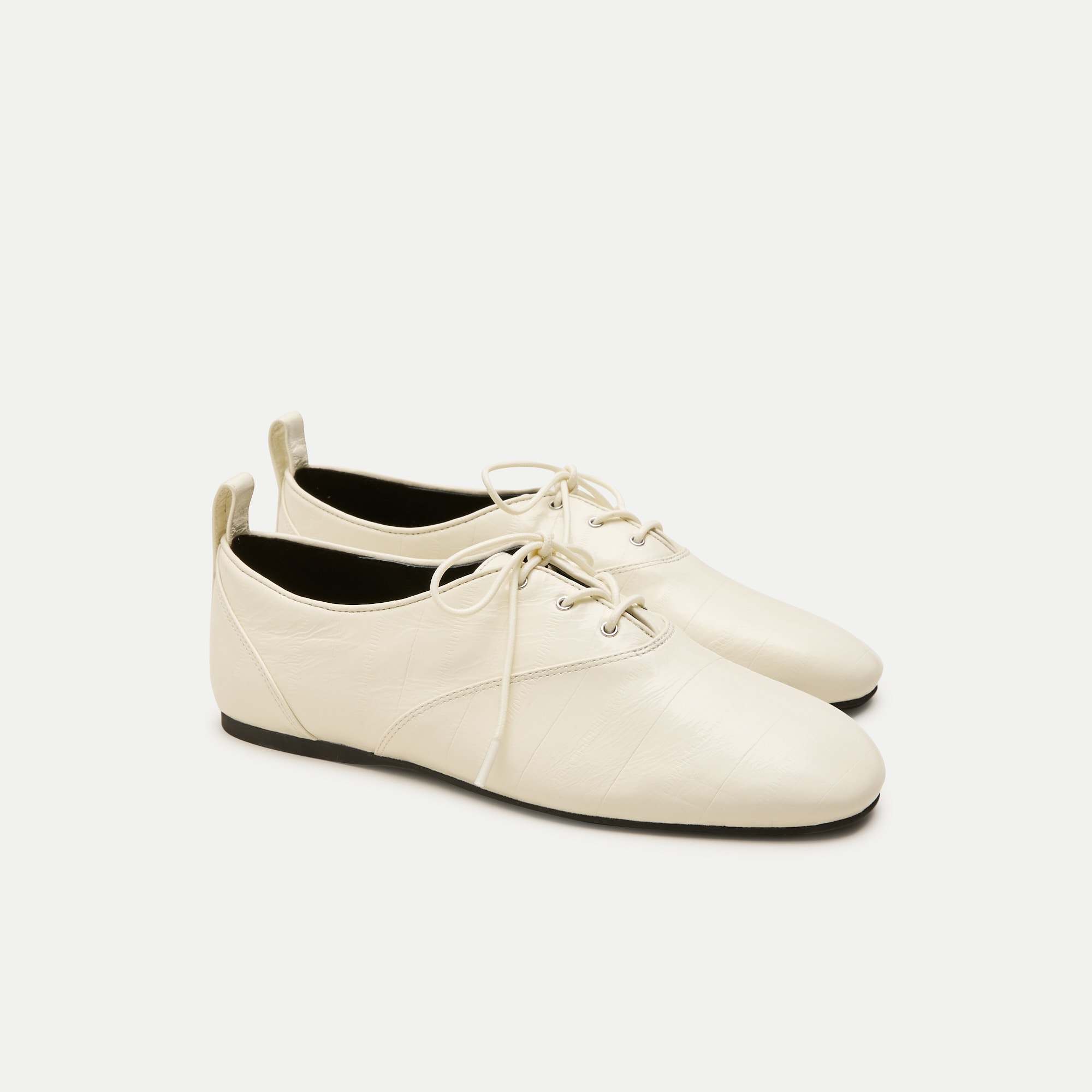 Verona lace-up flats in eel-embossed leather