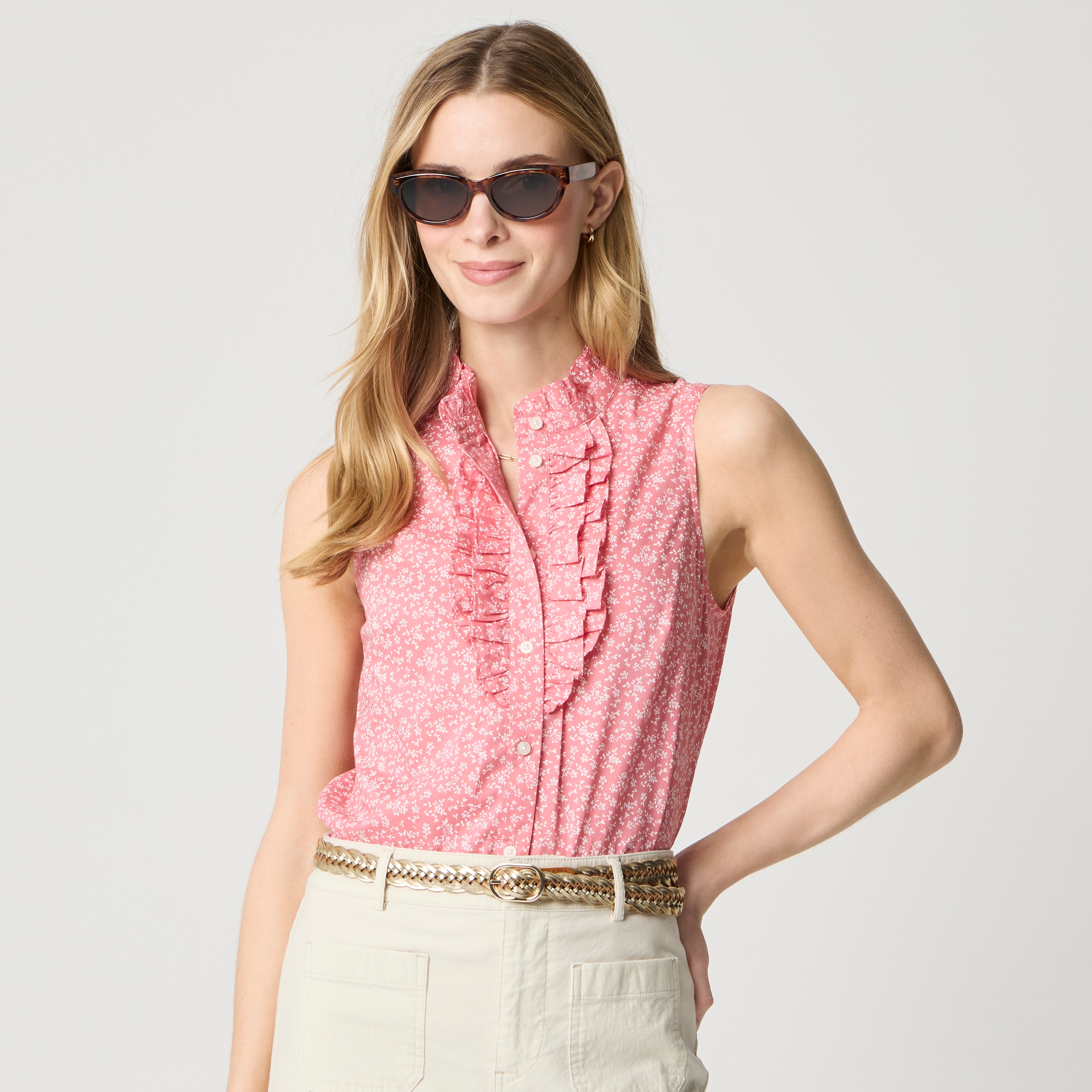 Sleeveless ruffle-front button-up shirt