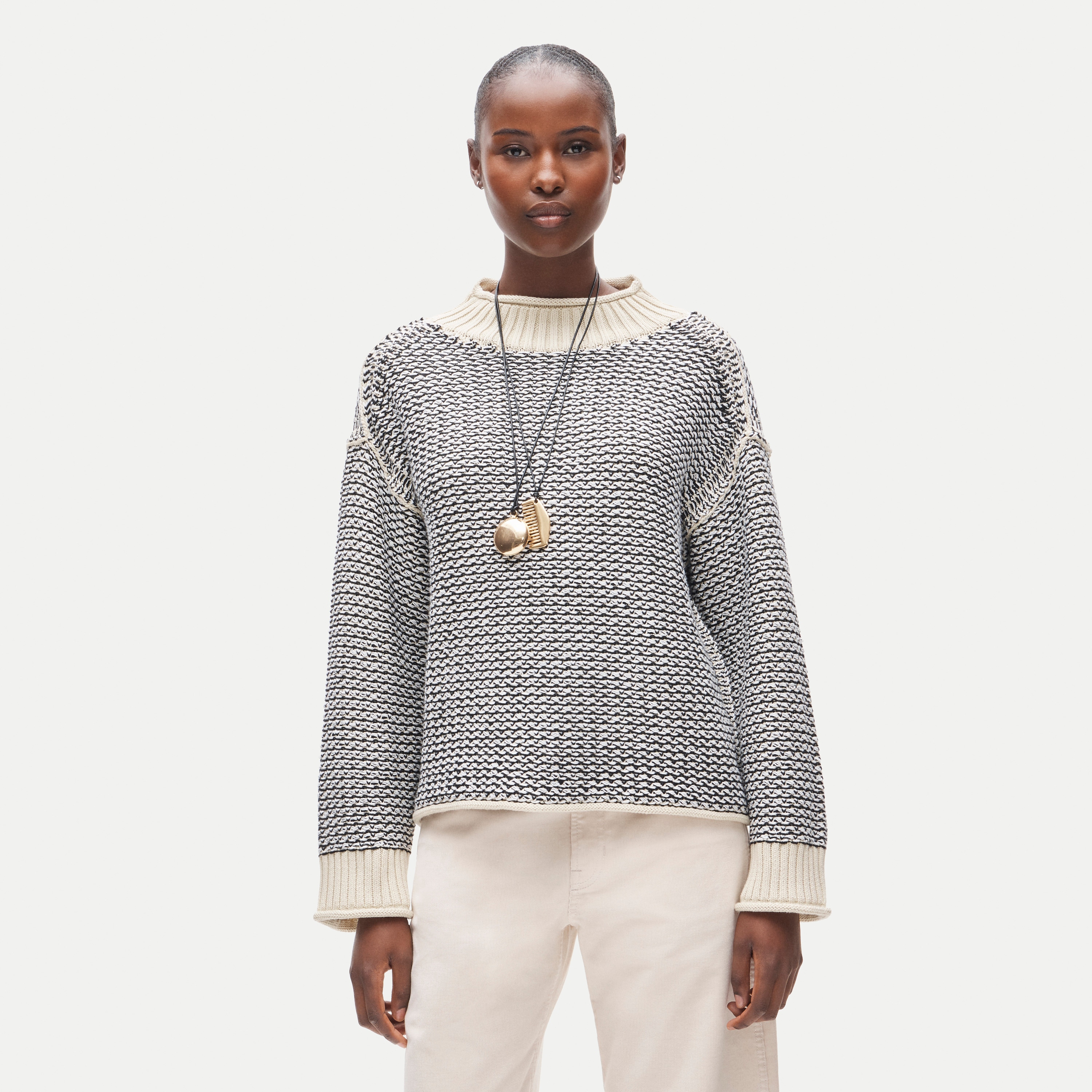 2025 Rollneck™ sweater in tweed stitch