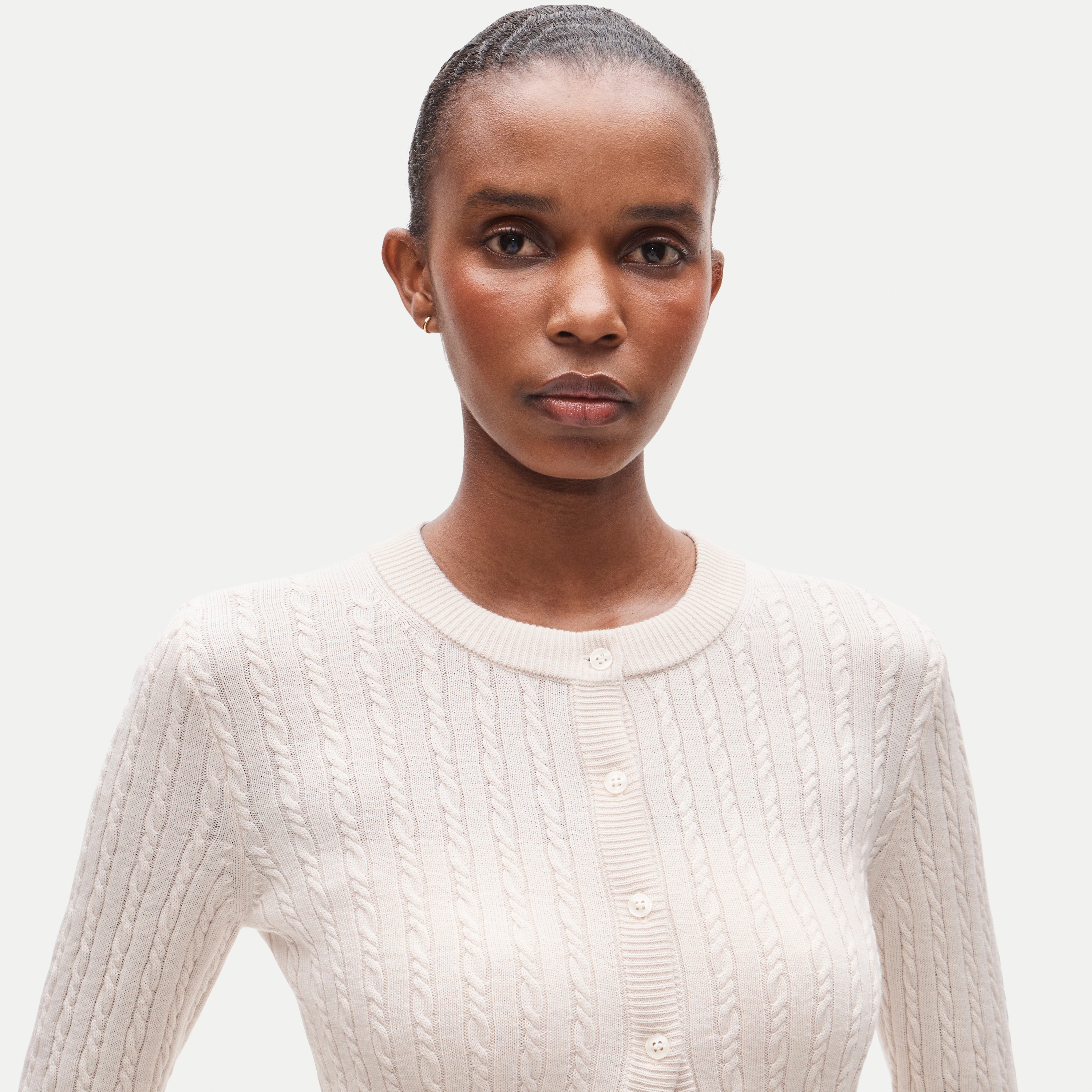 Cable-knit cardigan in merino wool blend