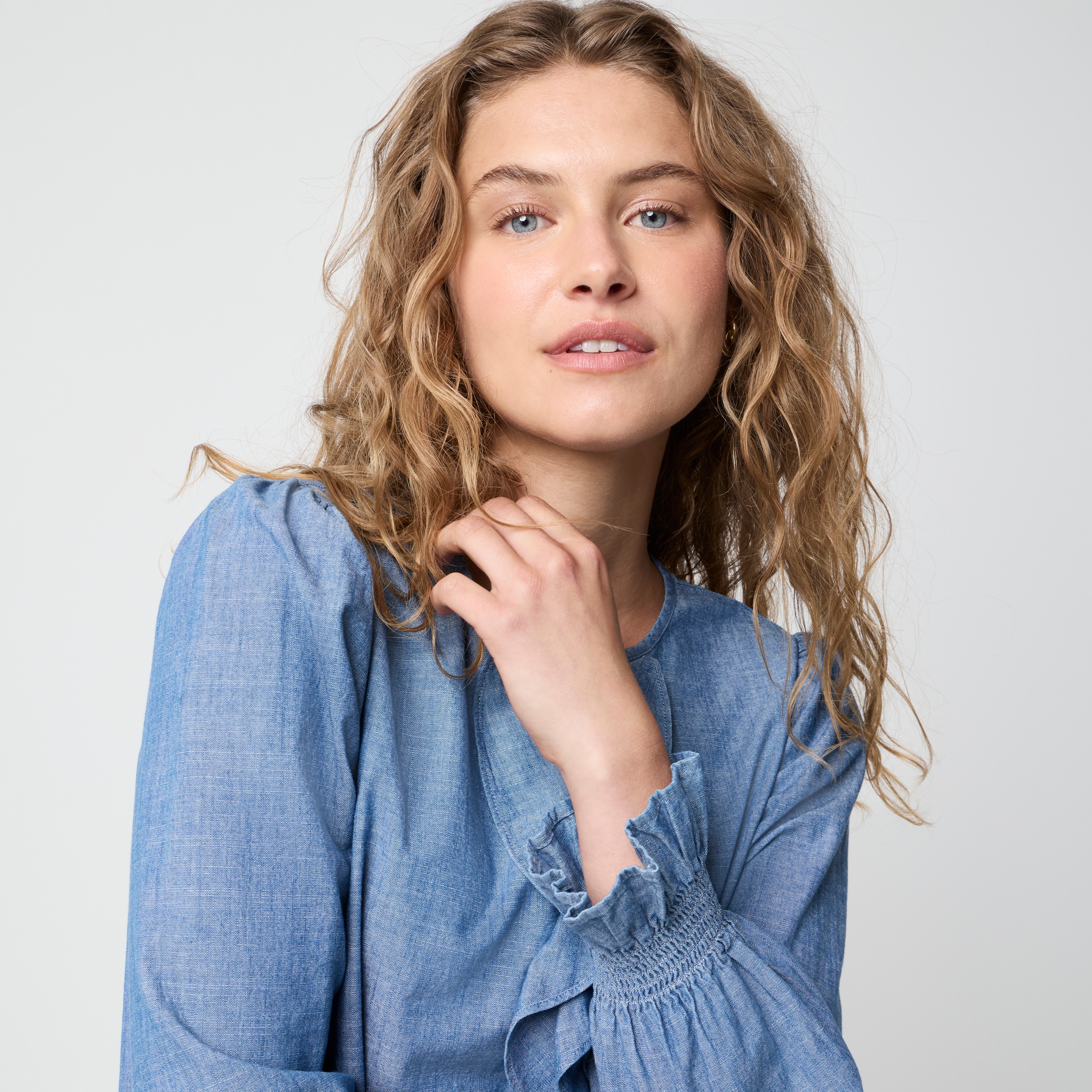 Chambray ruffle-front top