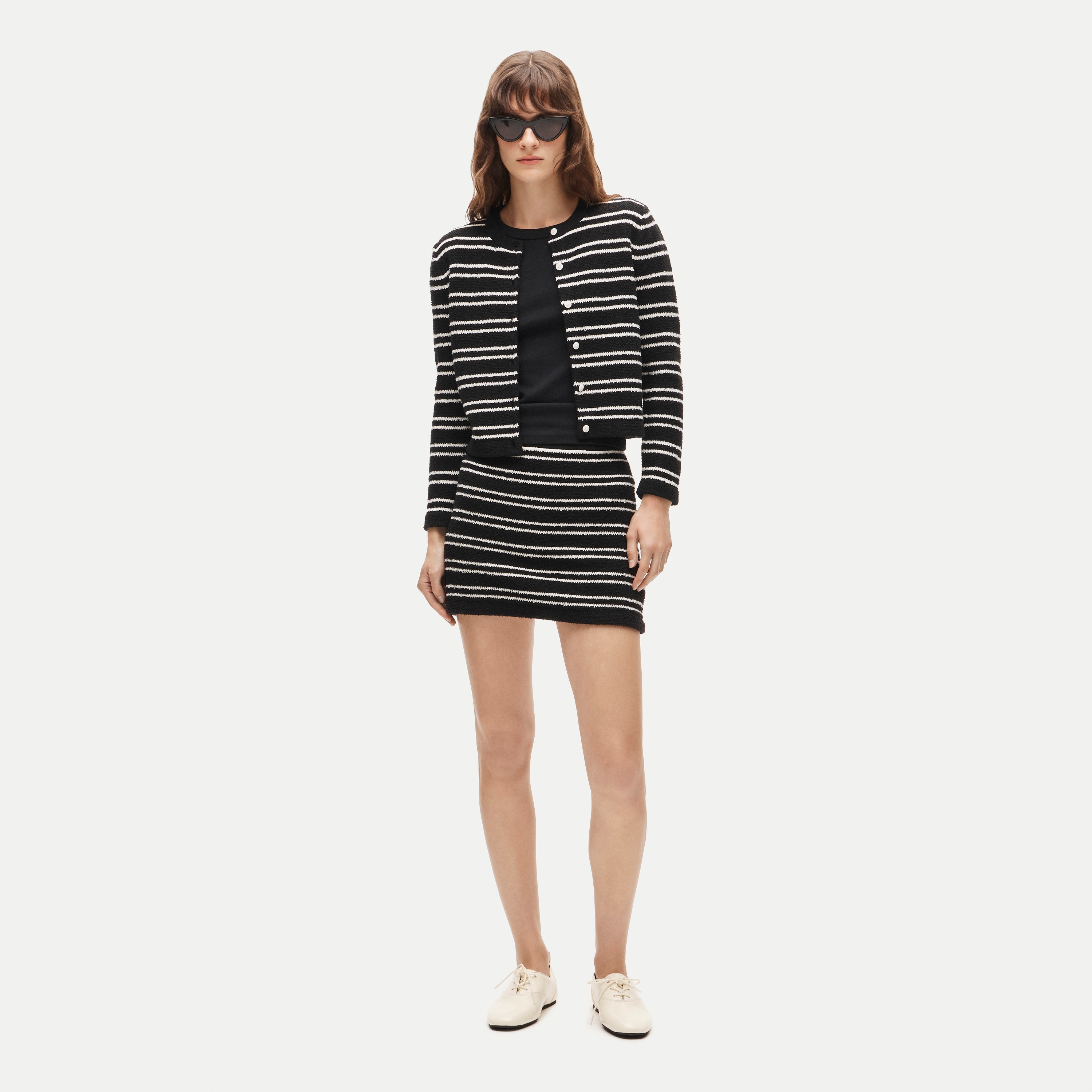 Mini knit sweater-skirt in stripe