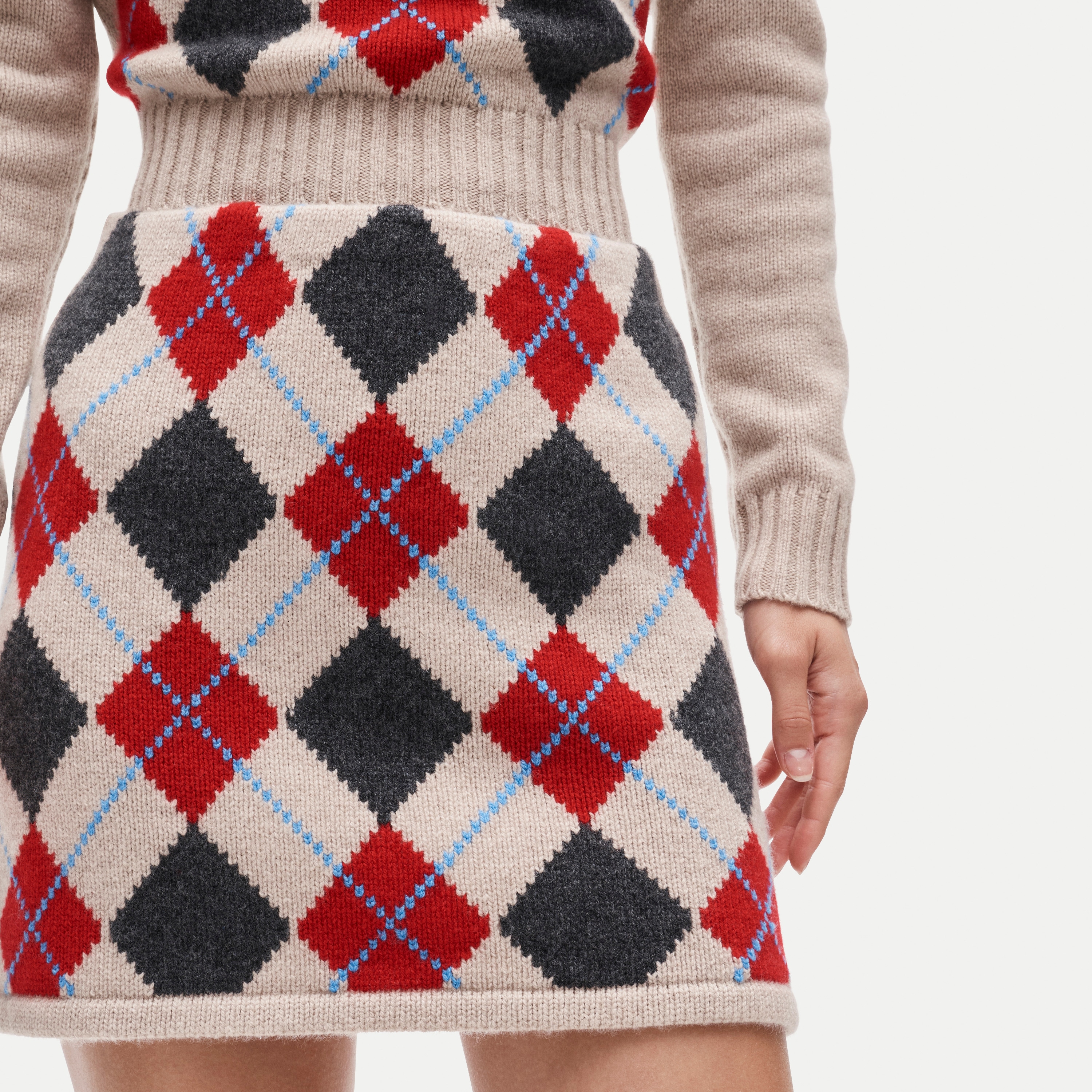 Mini knit sweater-skirt in argyle wool