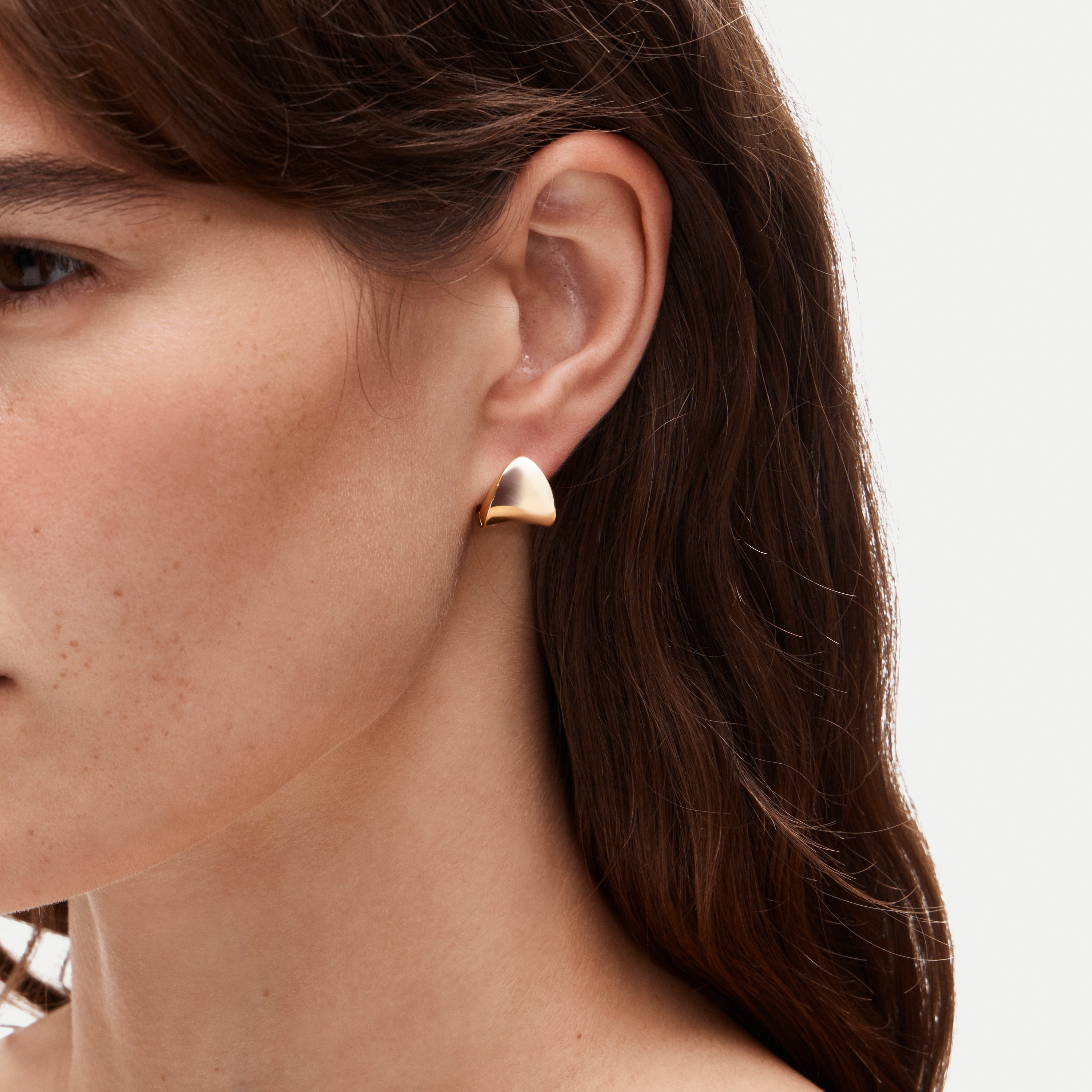 Wide huggie hoop earrings
