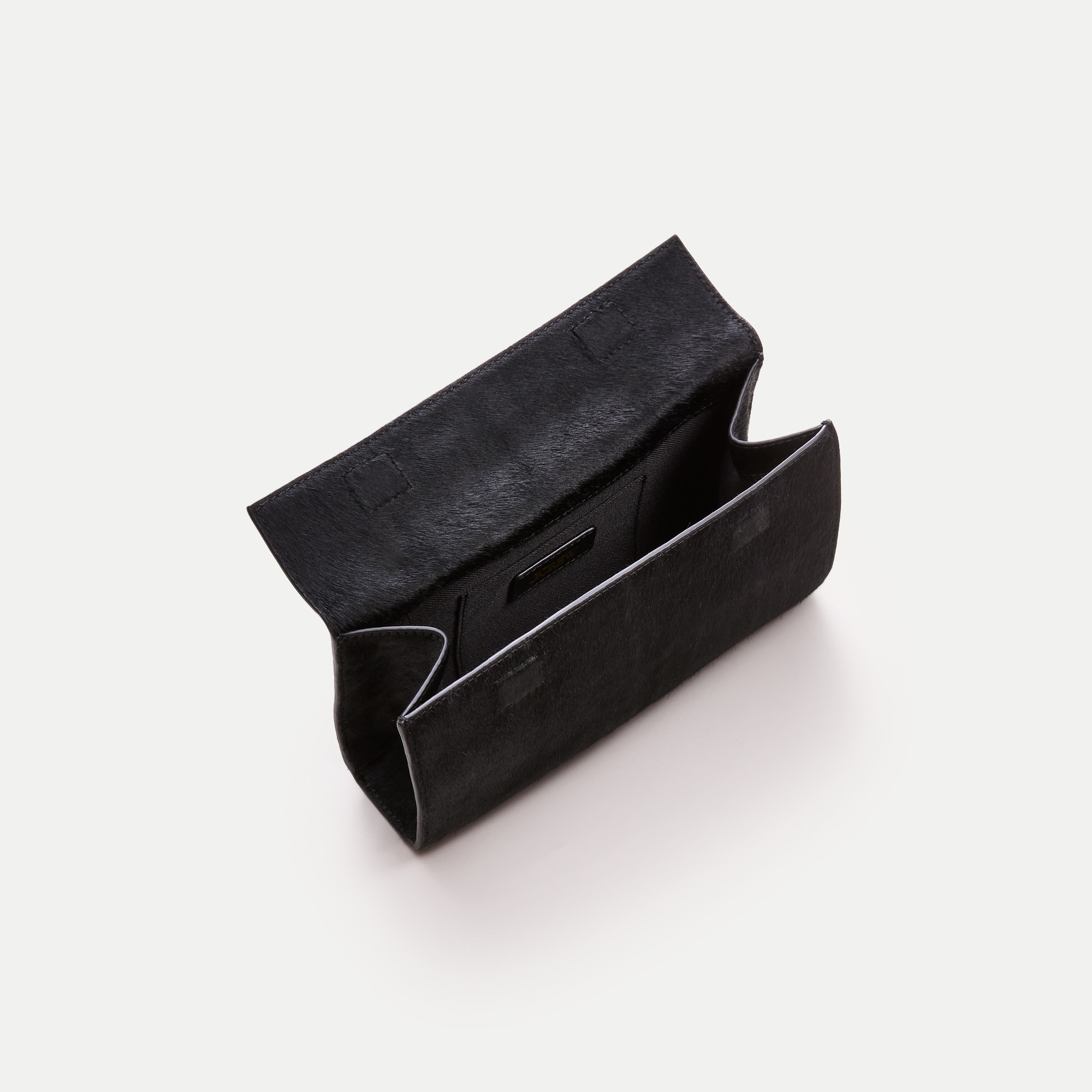 Structured clutch in calf hair