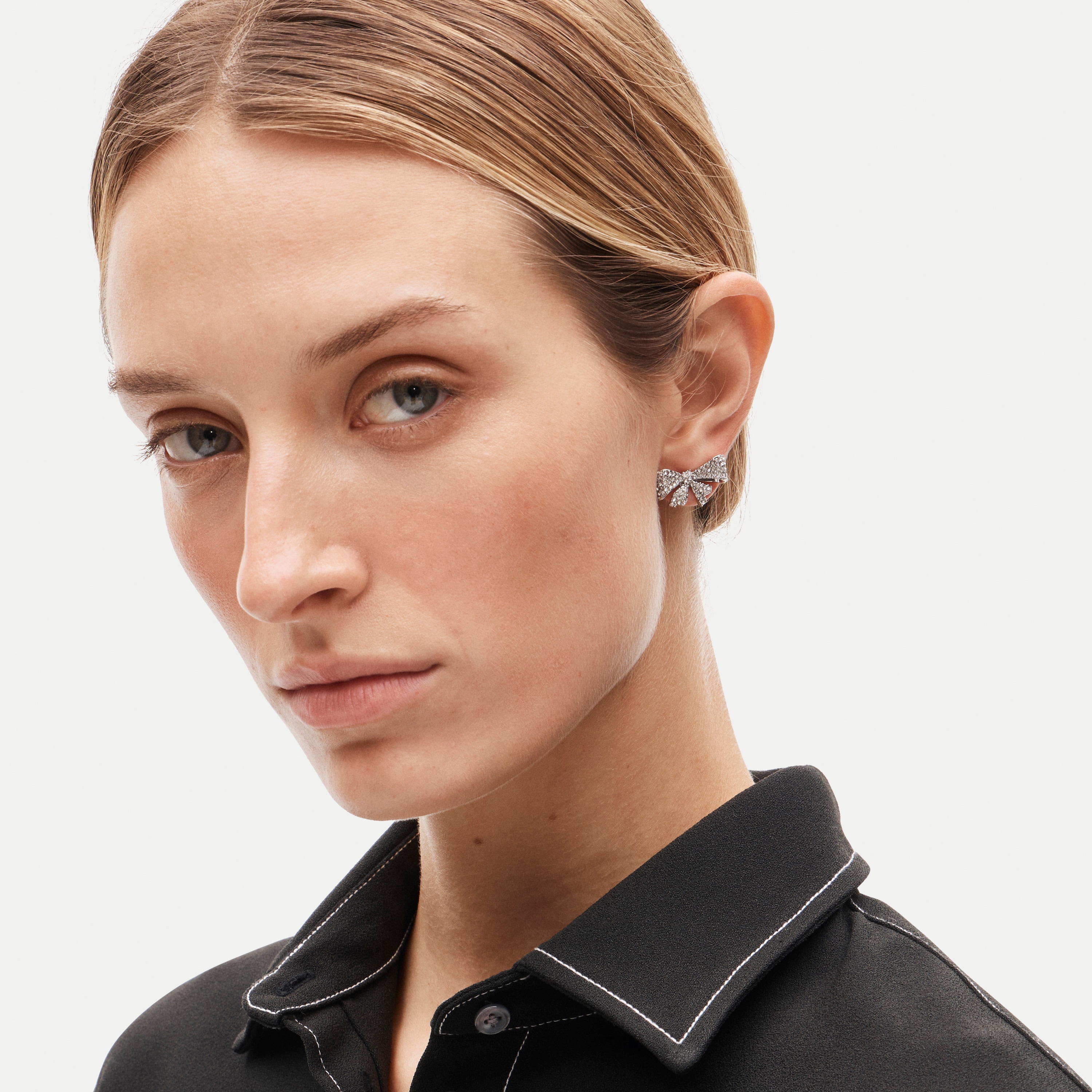 Pavé bow stud earrings