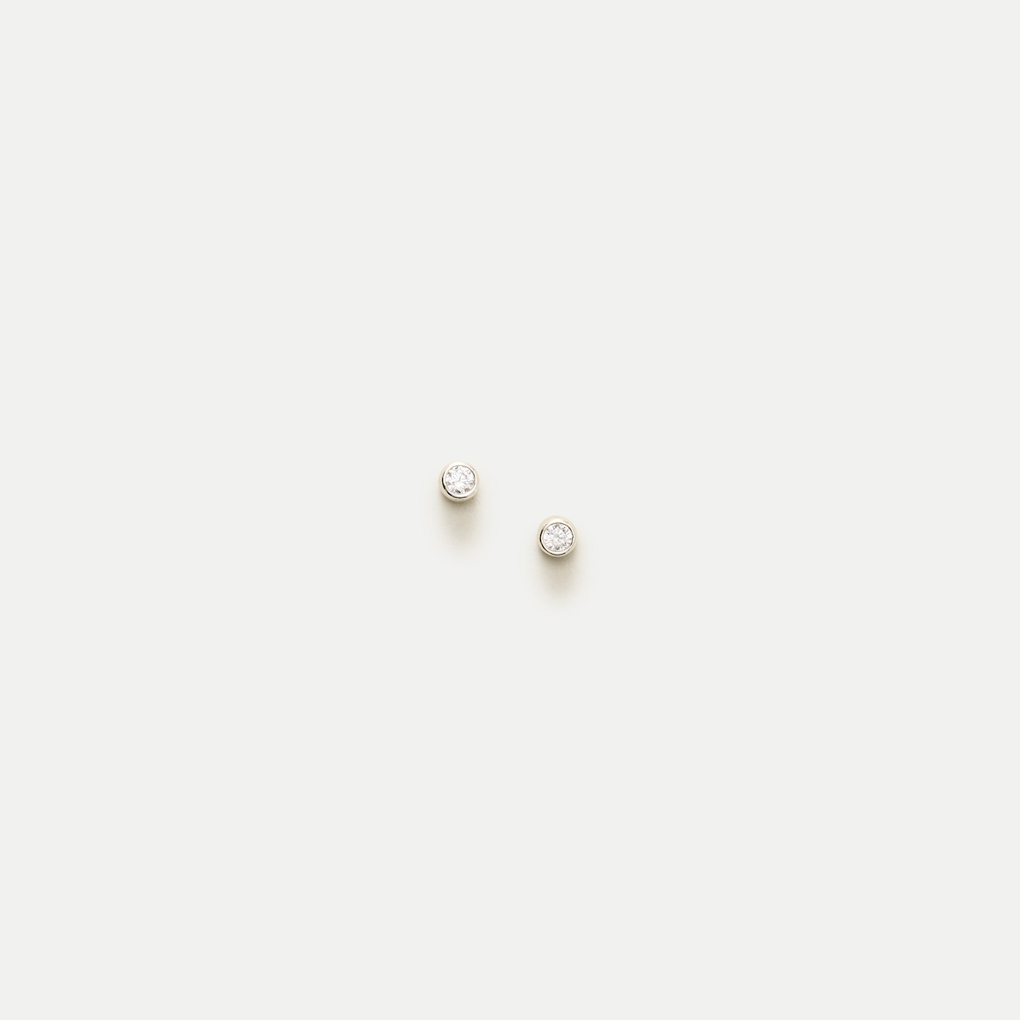 Tiny bezel stud earrings