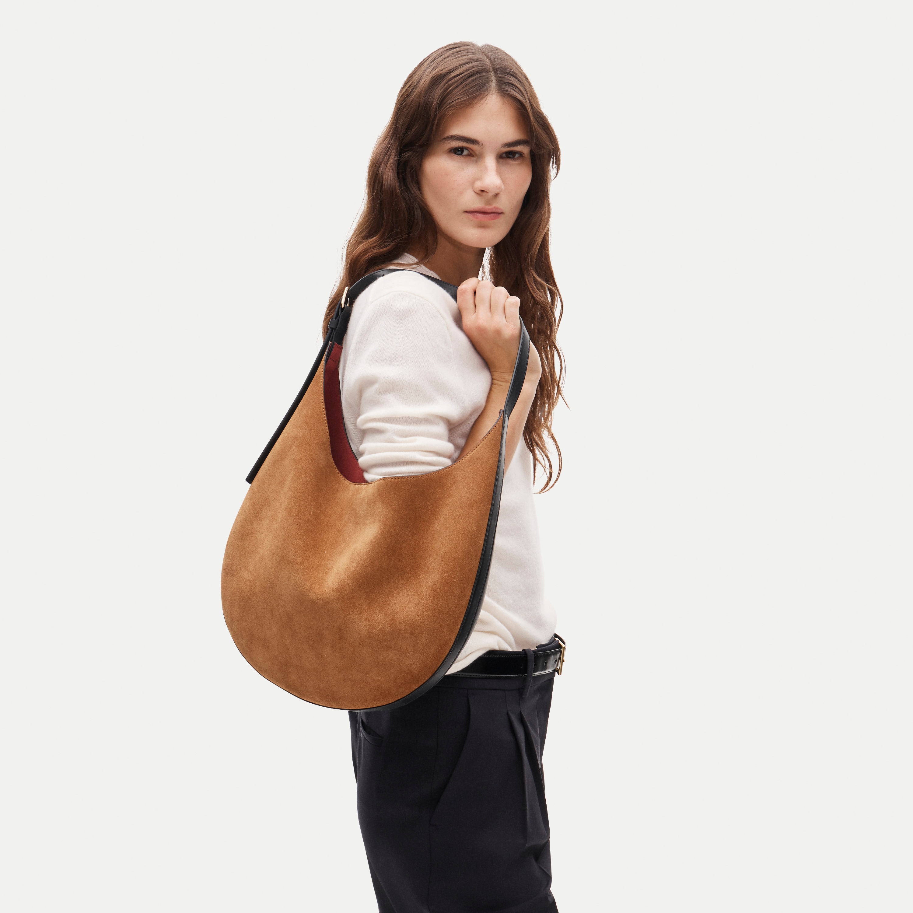 Round shoulder bag in suede