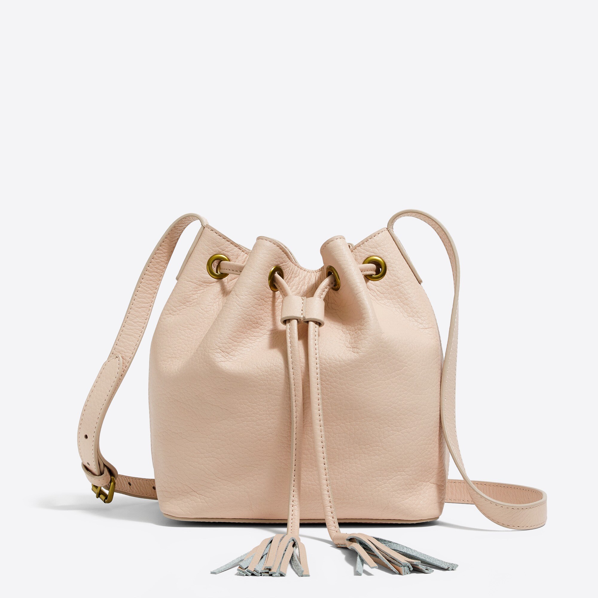 Leather bucket bag with tassels