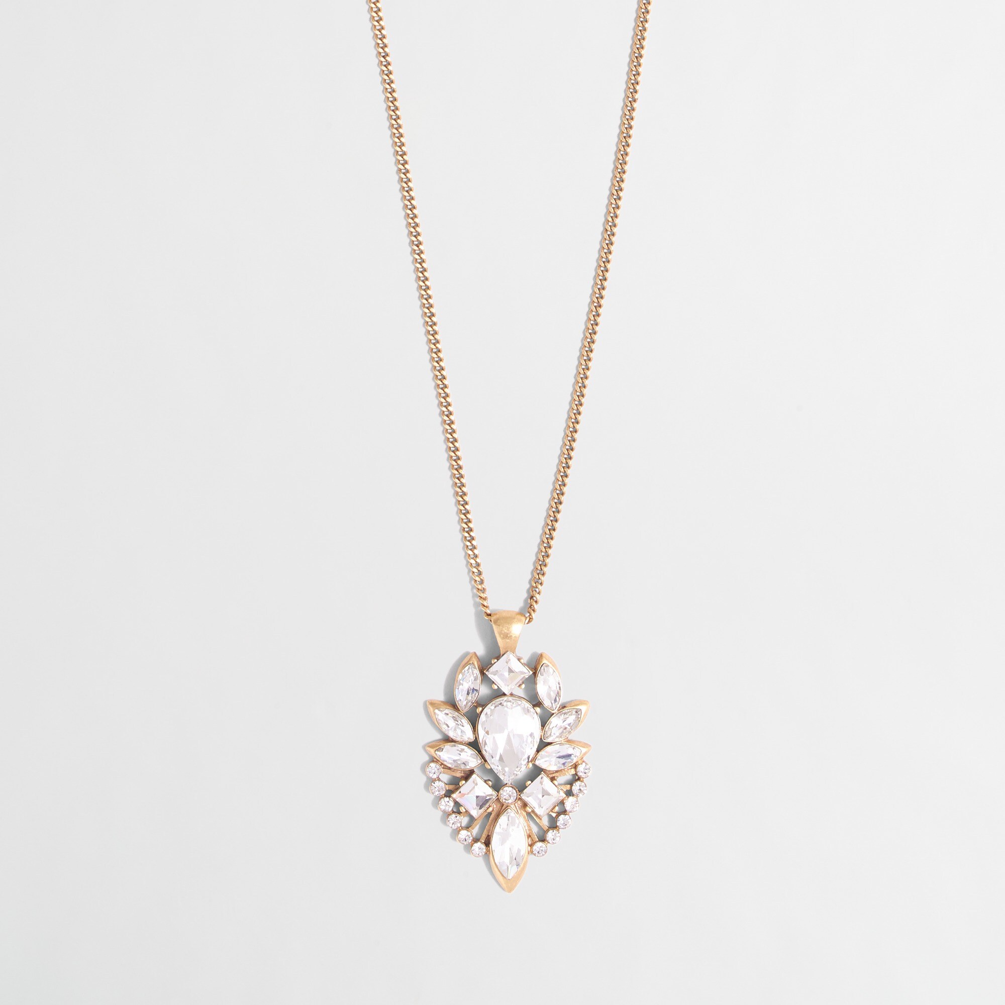 Crystal emblem pendant necklace
