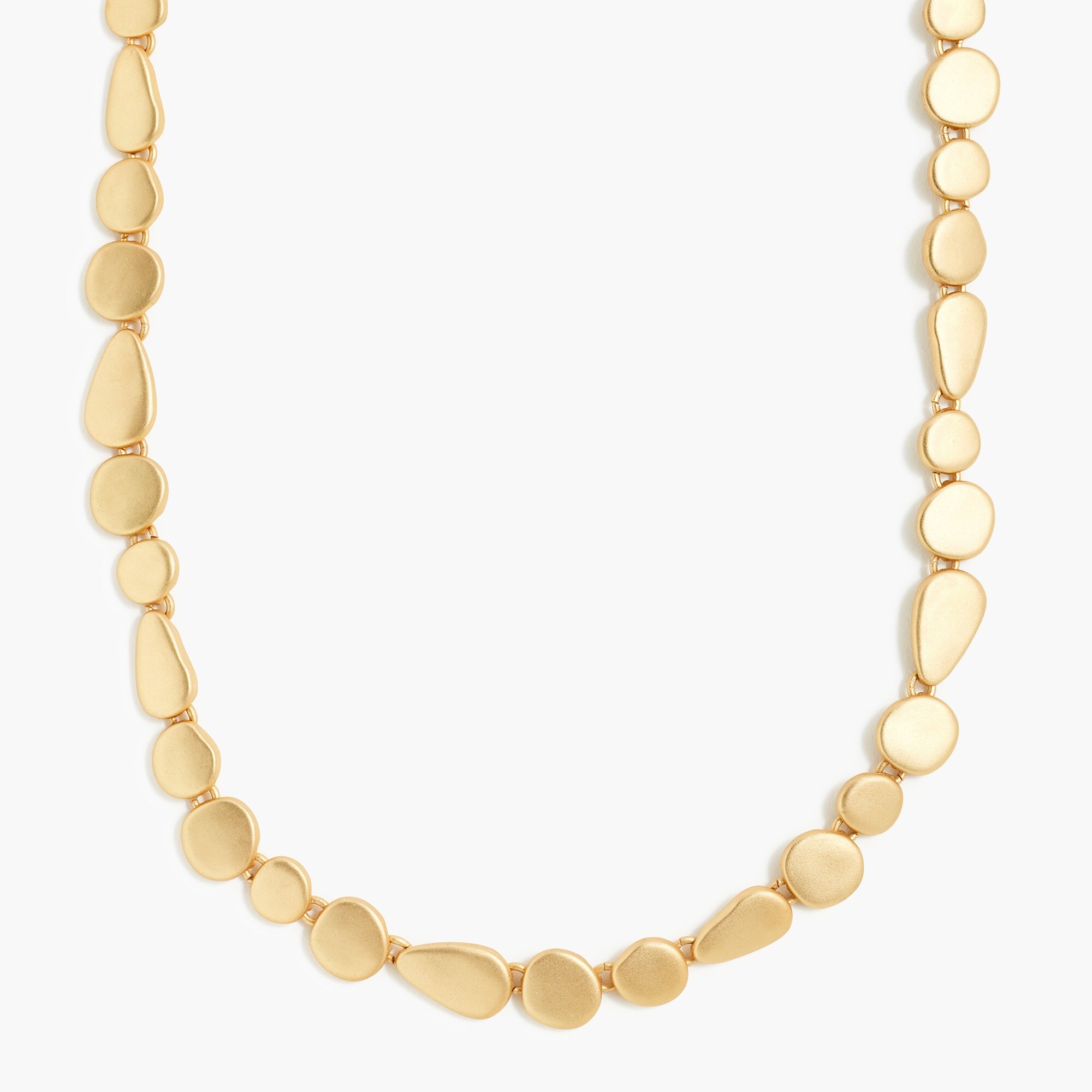 Asymmetrical gold disc statement necklace