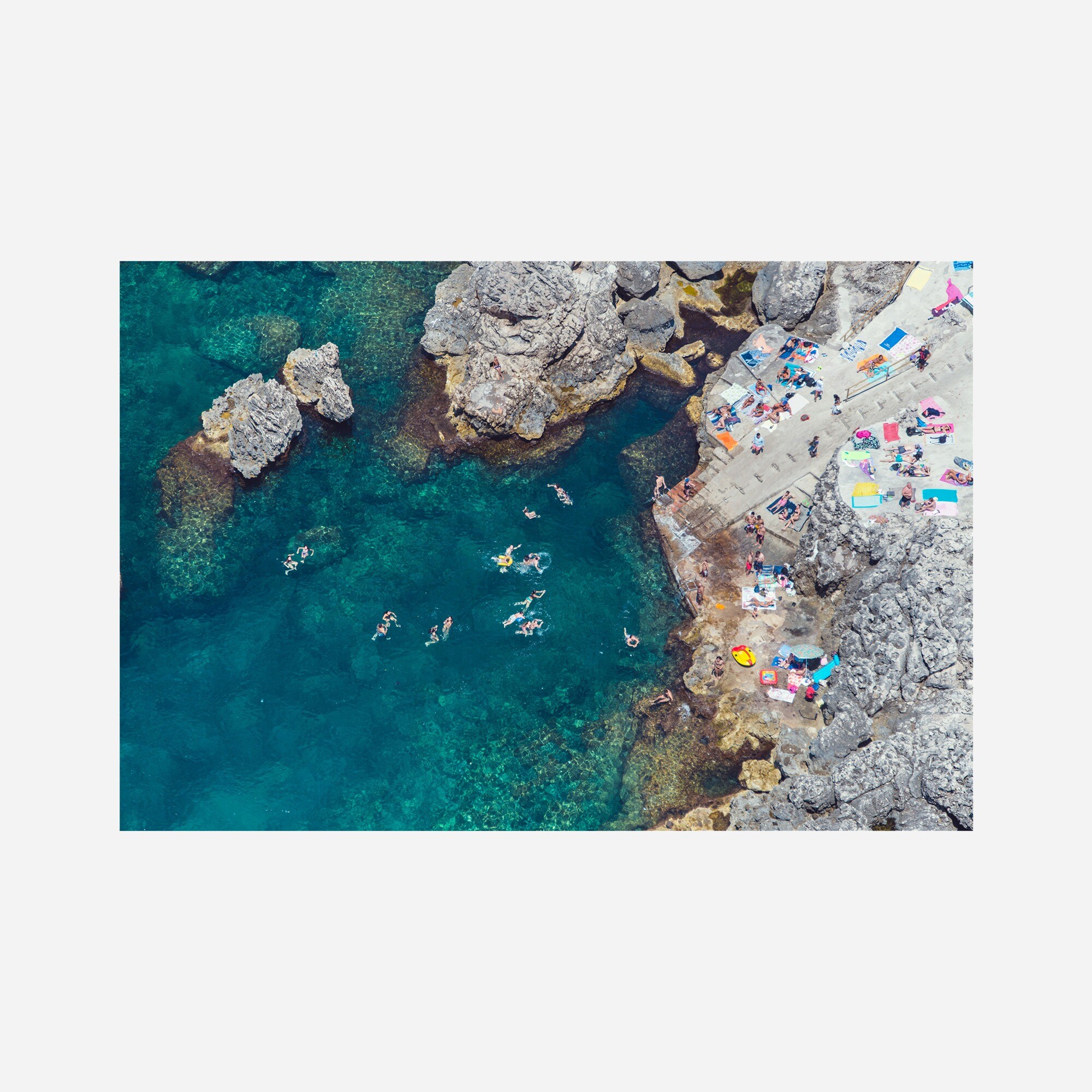  Gray Malin Lido del Faro swimmers, Capri