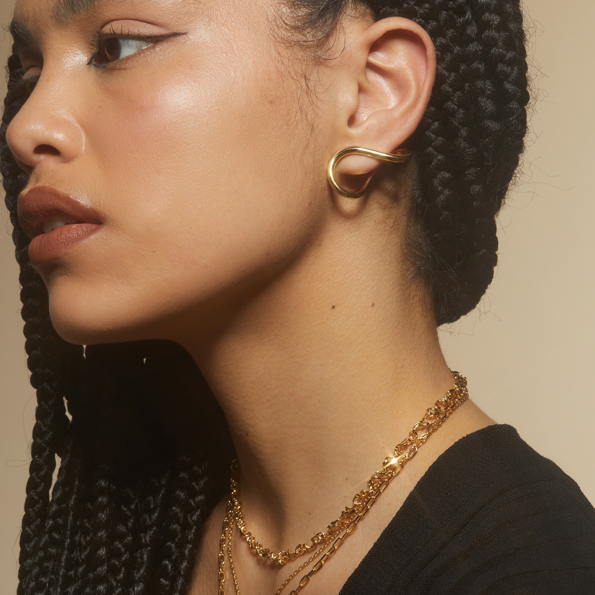 womens Lady Grey twisted lobe earrings in gold